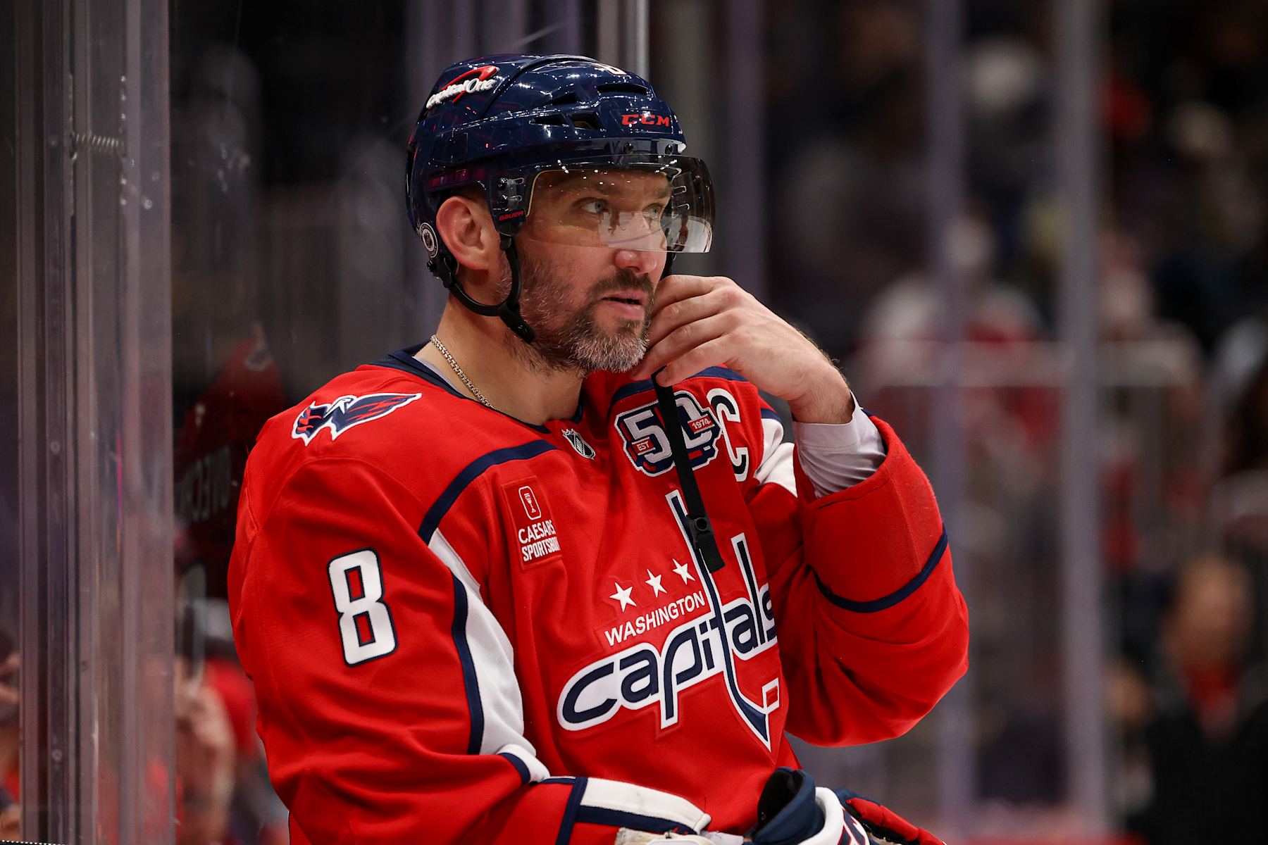 WASHINGTON, DC - SEPTEMBER 27: Alex Ovechkin #8 of the Washington Capitals rests during a TV Timeout during a preseason game against the Columbus Blue Jackets at Capital One Arena on September 27, 2024 in Washington, D.C. (Photo by John McCreary/NHLI via Getty Images)