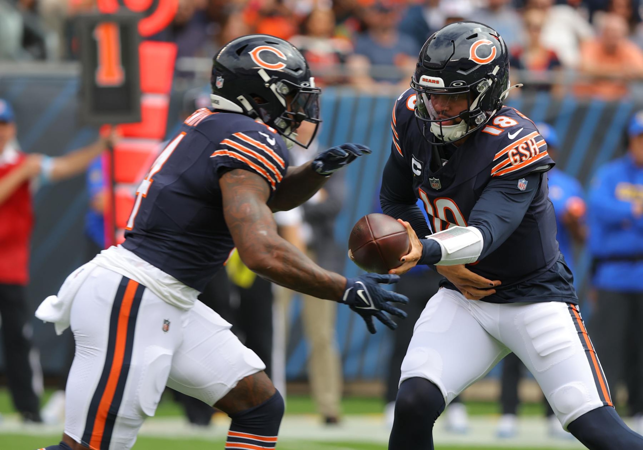Bears RB D'Andre Swift (left) and QB Caleb Williams (right)