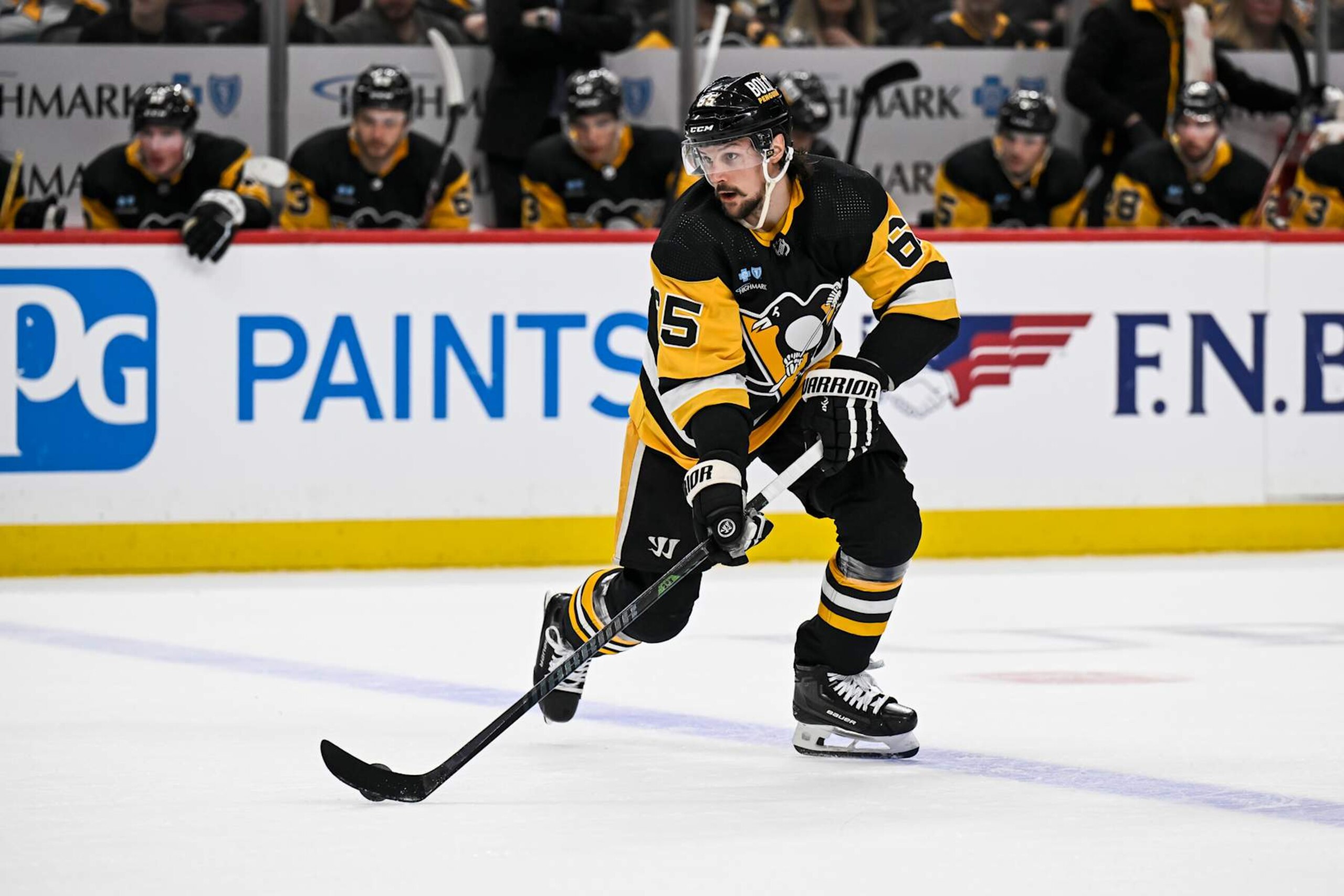 PITTSBURGH, PA - APRIL 13: Pittsburgh Penguins defenseman Erik Karlsson (65) skates with the puck during the second period in the NHL game between the Pittsburgh Penguins and the Boston Bruins on April 13, 2024, at PPG Paints Arena in Pittsburgh, PA. (Photo by Jeanine Leech/Icon Sportswire via Getty Images)