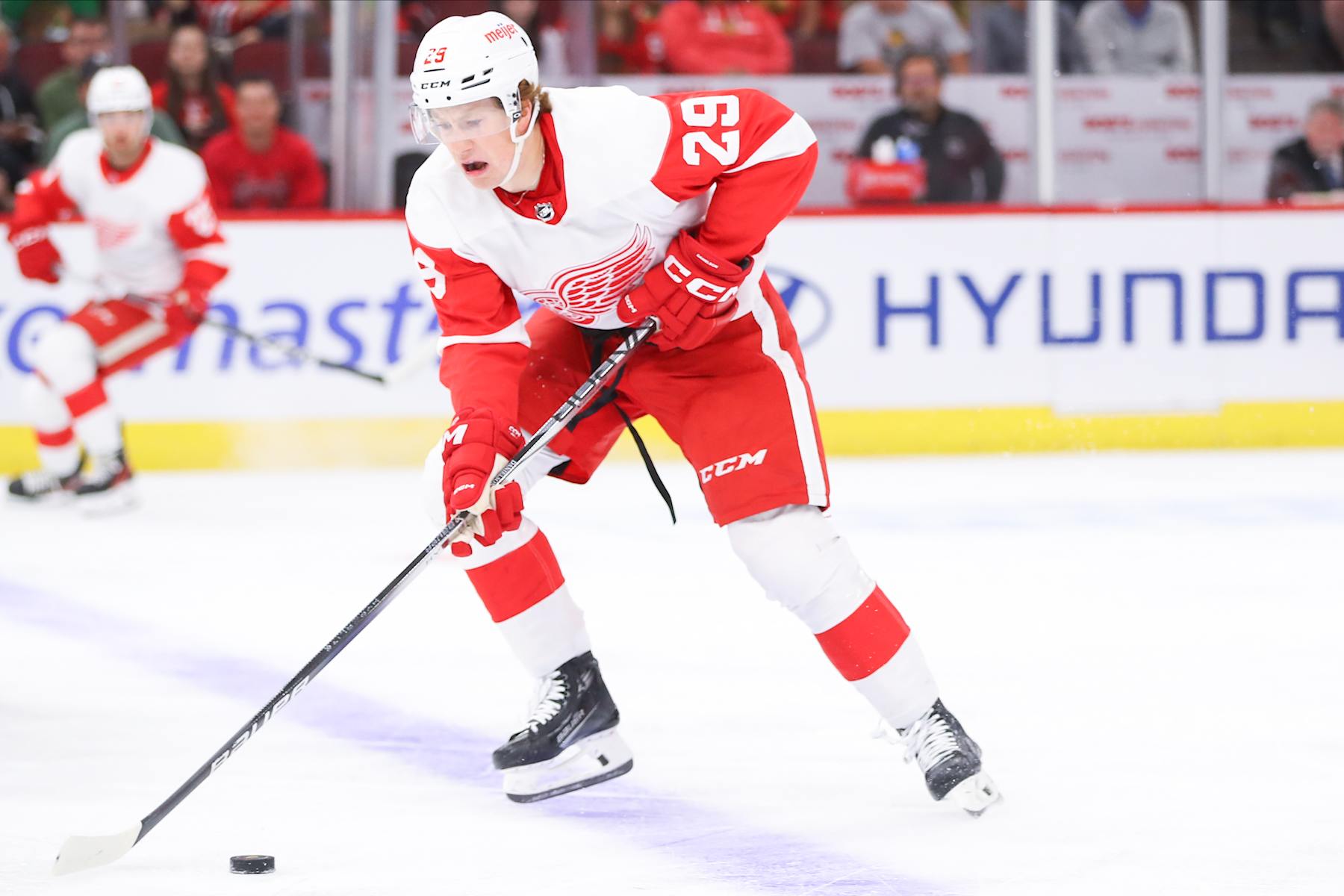 CHICAGO, IL - OCTOBER 03: Detroit Red Wings center Nate Danielson (29) controls the puck during a game between the Detroit Red Wings and the Chicago Blackhawks on October 3, 2023 at the United Center in Chicago, IL. (Photo by Melissa Tamez/Icon Sportswire via Getty Images)