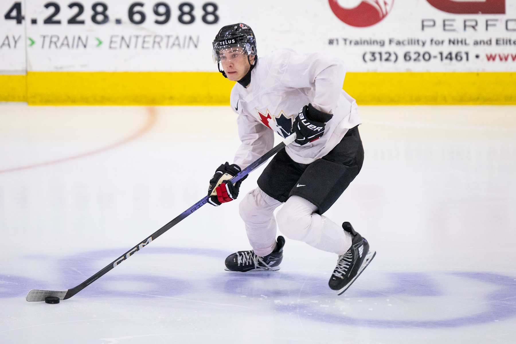 PLYMOUTH, MI - AUGUST 2: Beckett Sennecke #20 of Team Canada skates with the puck during the 2024 World Junior Summer Showcase between Finland and Canada at USA Hockey Arena on August 2, 2024 in Plymouth, Michigan. (Photo by Michael Miller/ISI Photos/Getty Images)