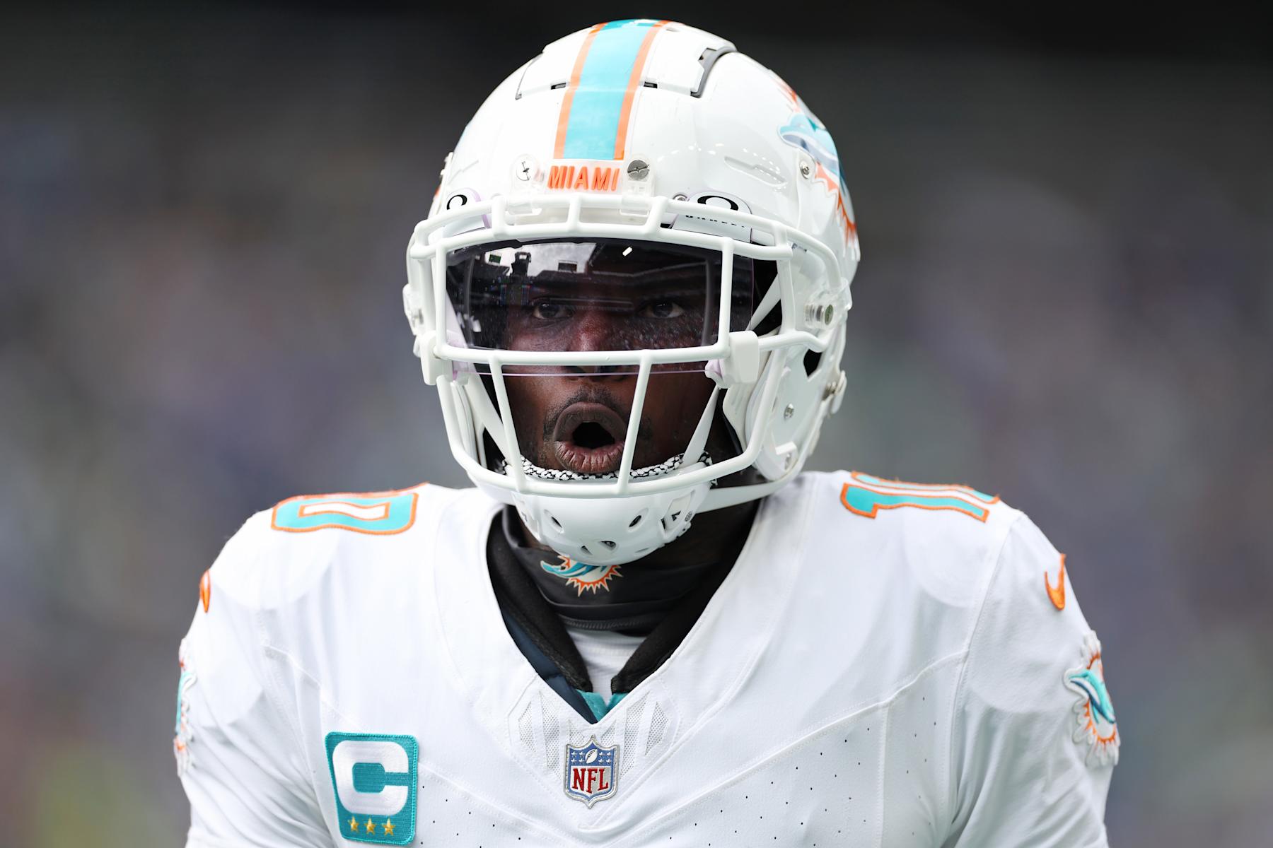 SEATTLE, WASHINGTON - SEPTEMBER 22: Tyreek Hill #10 of the Miami Dolphins looks on during the first half against the Seattle Seahawks at Lumen Field on September 22, 2024 in Seattle, Washington. (Photo by Steph Chambers/Getty Images)