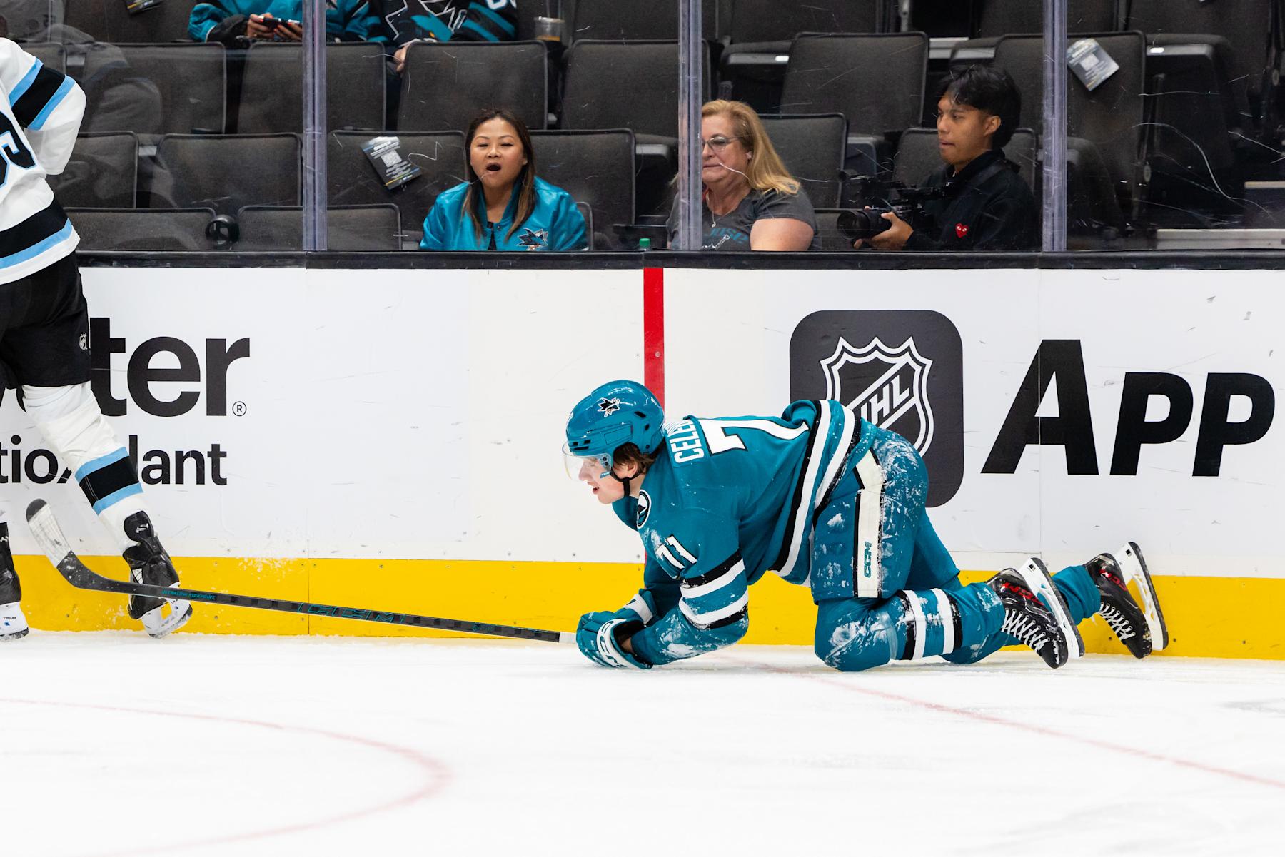 SAN JOSE, CA - OCTOBER 01: San Jose Sharks center Macklin Celebrini (71) gets up from the ice during a preseason NHL game between the Utah Hockey Club and the San Jose Sharks on October 1, 2024 at SAP Center at San Jose in San Jose, CA. (Photo by Matthew Huang/Icon Sportswire via Getty Images)