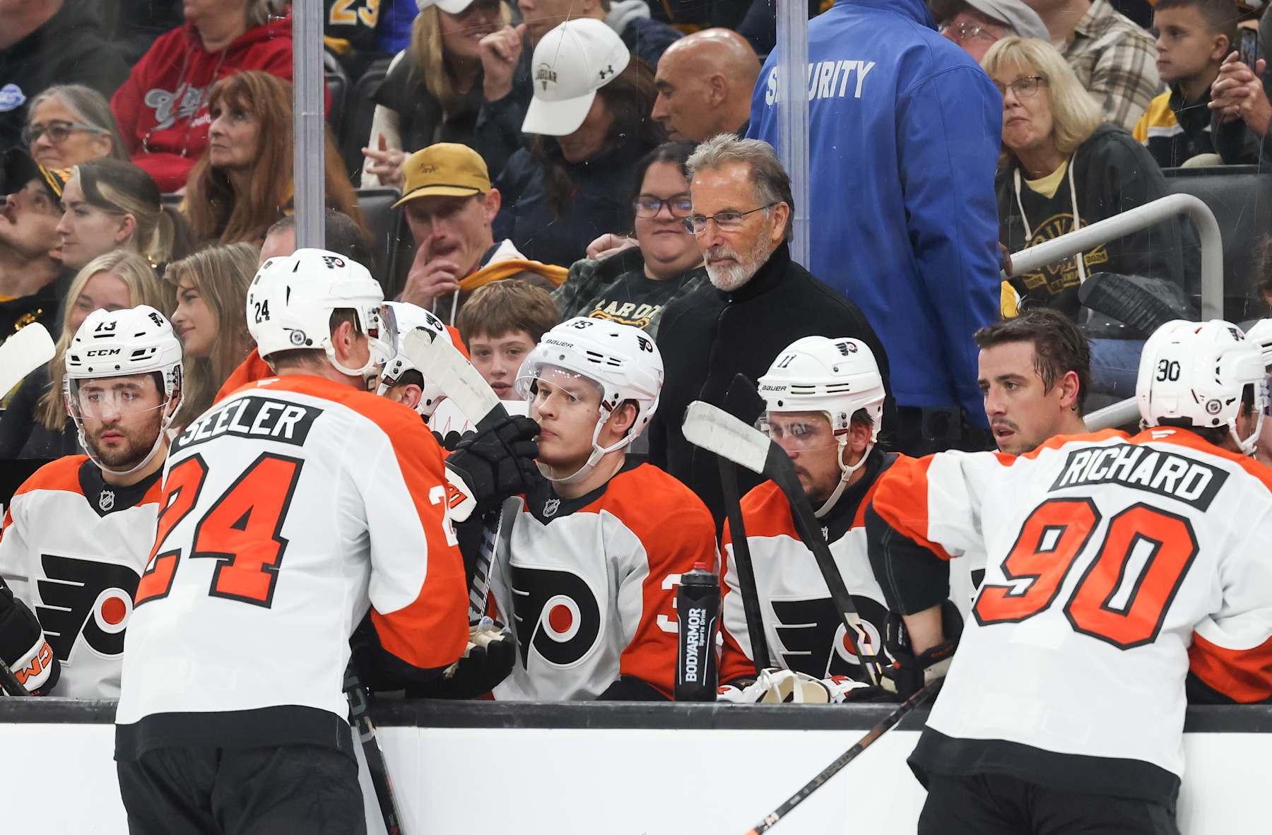 BOSTON, MASSACHUSETTS - OCTOBER 1: Head coach John Tortorella of the Philadelphia Flyers stands behind the bench during a game against the Boston Bruins during the second period at the TD Garden during a preseason game on October 1, 2024 in Boston, Massachusetts. The Bruins won 4-1. (Photo by Richard T Gagnon/Getty Images)
