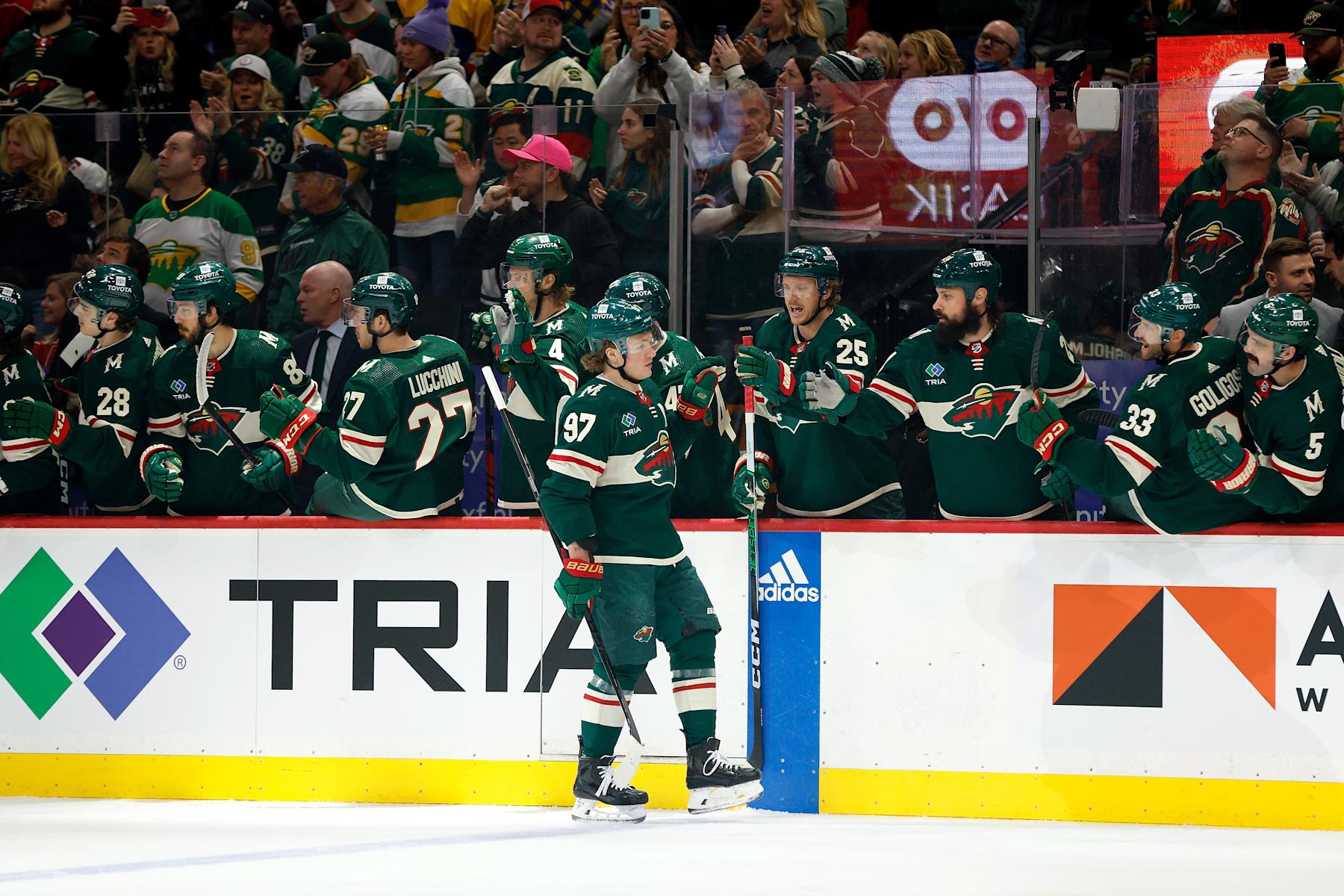 ST PAUL, MINNESOTA - APRIL 18: Kirill Kaprizov #97 of the Minnesota Wild celebrates his power-play goal against the Seattle Kraken with teammates in the first period at Xcel Energy Center on April 18, 2024 in St Paul, Minnesota. (Photo by David Berding/Getty Images)