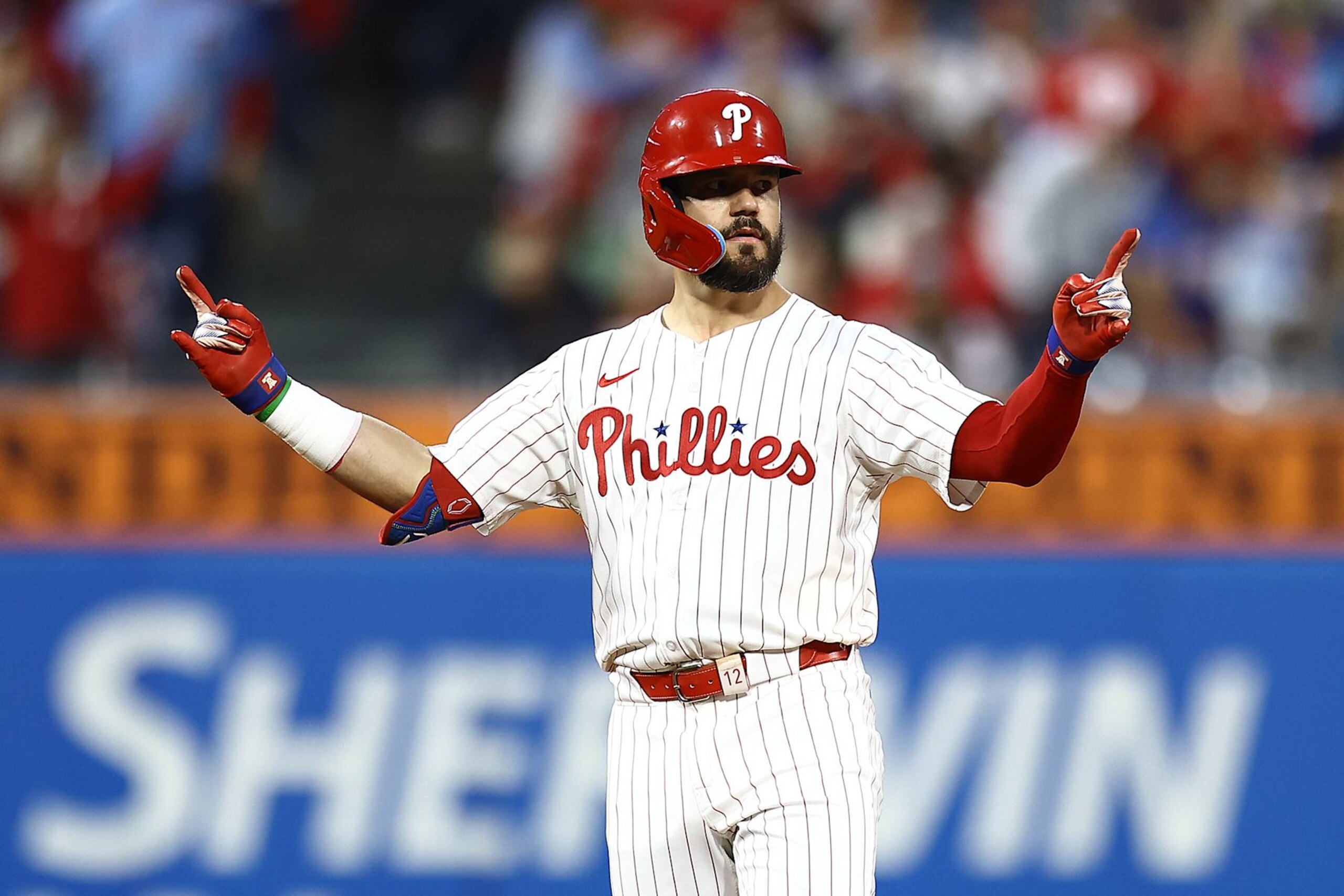 PHILADELPHIA, PENNSYLVANIA - SEPTEMBER 25: Kyle Schwarber #12 of the Philadelphia Phillies reacts after hitting a double during the second inning against the Chicago Cubs at Citizens Bank Park on September 25, 2024 in Philadelphia, Pennsylvania. (Photo by Tim Nwachukwu/Getty Images)