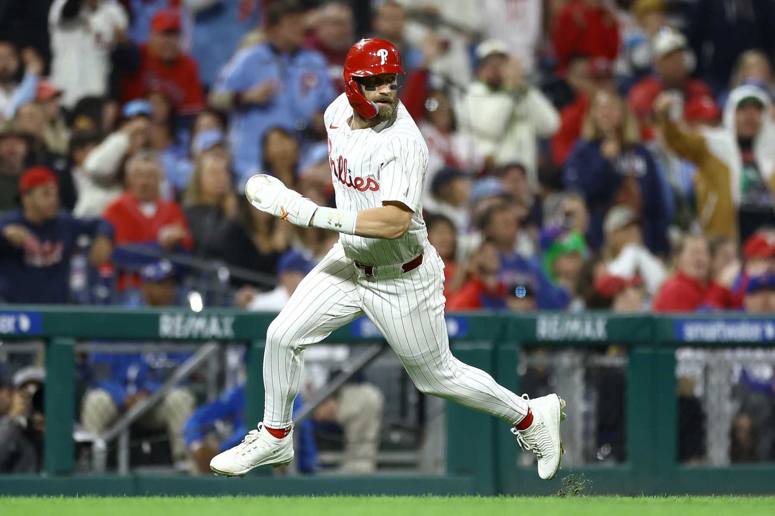 PHILADELPHIA, PENNSYLVANIA - SEPTEMBER 23: Bryce Harper #3 of the Philadelphia Phillies rounds bases to score during the fifth inning against the Chicago Cubs at Citizens Bank Park on September 23, 2024 in Philadelphia, Pennsylvania. (Photo by Tim Nwachukwu/Getty Images)