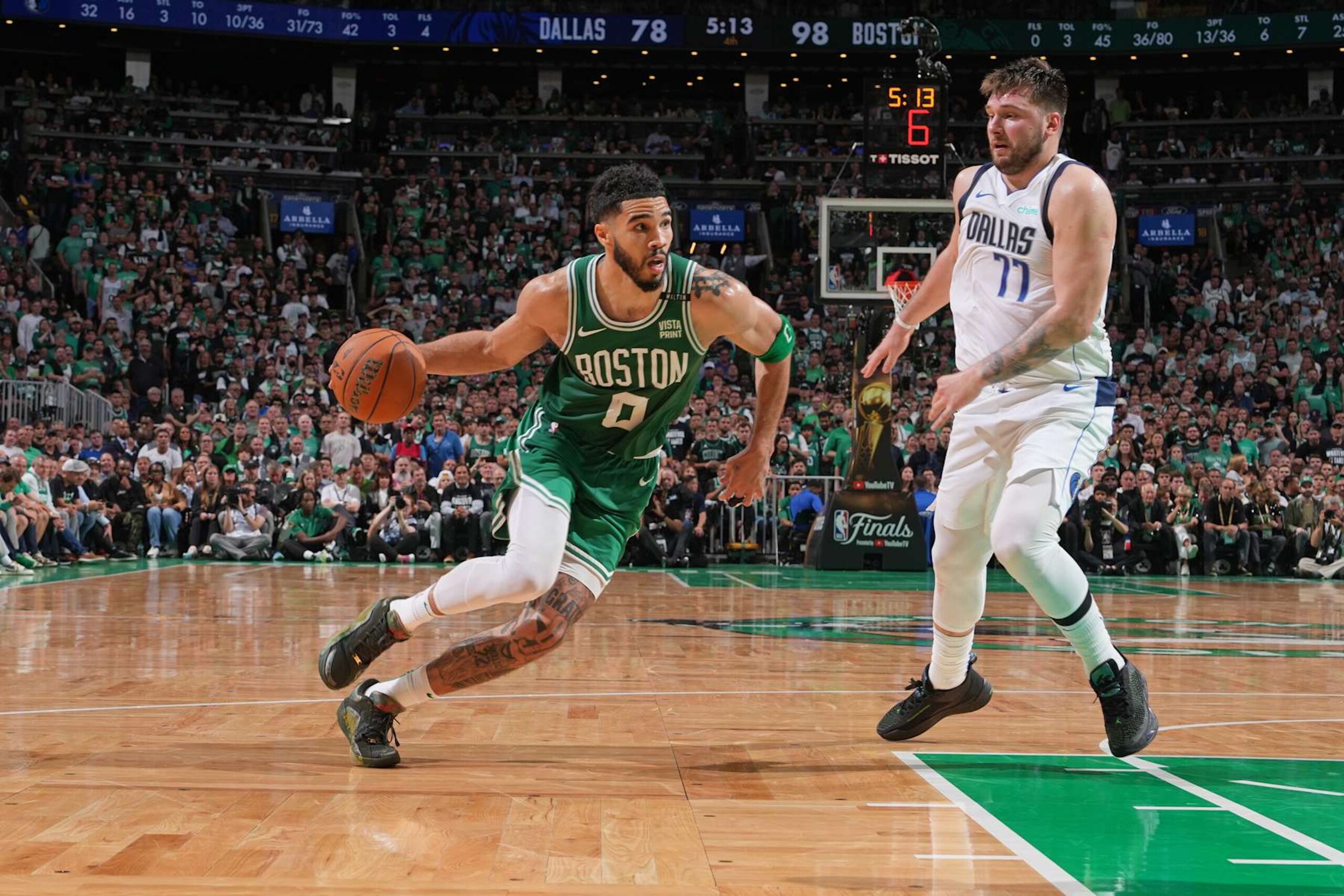 BOSTON, MA - JUNE 17: Jayson Tatum #0 of the Boston Celtics dribbles the ball during the game against the Dallas Mavericks during Game 5 of the 2024 NBA Finals on June 17, 2024 at the TD Garden in Boston, Massachusetts. NOTE TO USER: User expressly acknowledges and agrees that, by downloading and or using this photograph, User is consenting to the terms and conditions of the Getty Images License Agreement. Mandatory Copyright Notice: Copyright 2024 NBAE  (Photo by Jesse D. Garrabrant/NBAE via Getty Images)