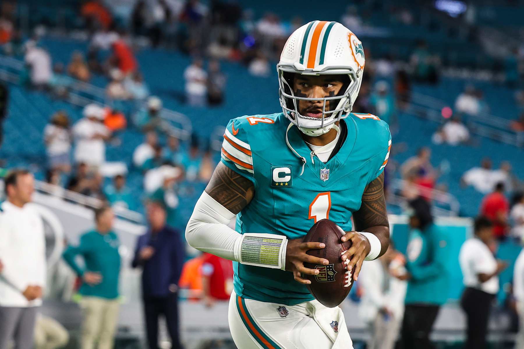 MIAMI GARDENS, FL - SEPTEMBER 12: Tua Tagovailoa #1 of the Miami Dolphins warms up prior to an NFL football game against the Buffalo Bills at Hard Rock Stadium on September 12, 2024 in Miami Gardens, FL. (Photo by Perry Knotts/Getty Images)