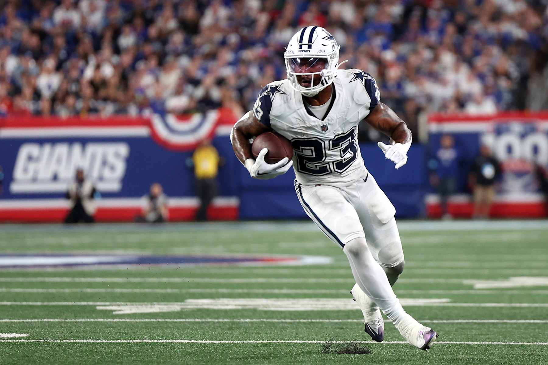 EAST RUTHERFORD, NEW JERSEY - SEPTEMBER 26: Rico Dowdle #23 of the Dallas Cowboys in action \a at MetLife Stadium on September 26, 2024 in East Rutherford, New Jersey. (Photo by Luke Hales/Getty Images)