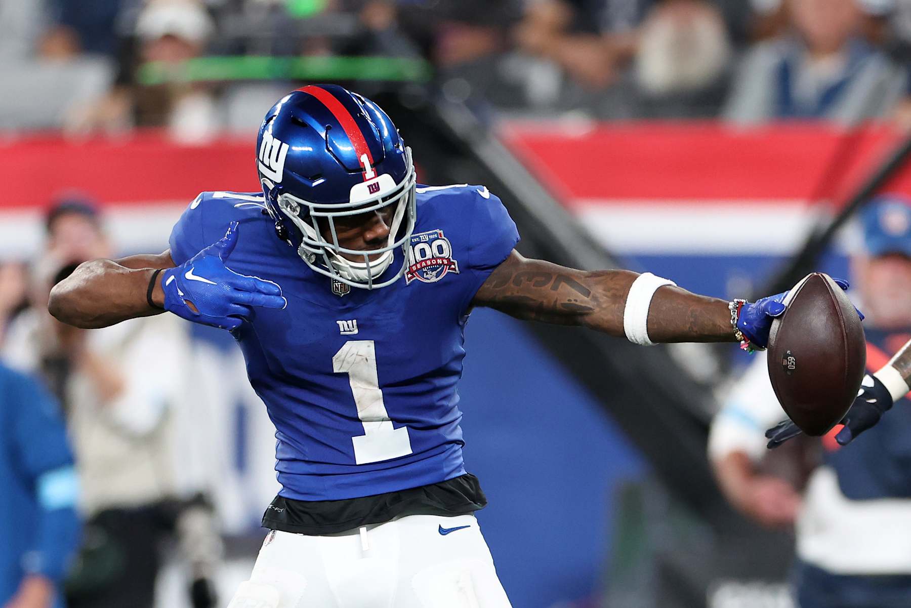 EAST RUTHERFORD, NEW JERSEY - SEPTEMBER 26: Malik Nabers #1 of the New York Giants celebrates a reception during the third quarter against the Dallas Cowboys at MetLife Stadium on September 26, 2024 in East Rutherford, New Jersey. (Photo by Luke Hales/Getty Images)