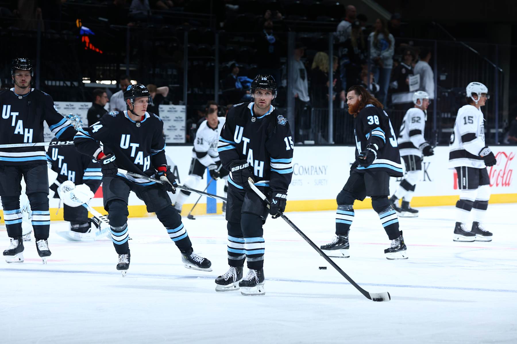 The Utah Hockey Club during warmups before their first preseason home game at the Delta Center in Salt Lake City.