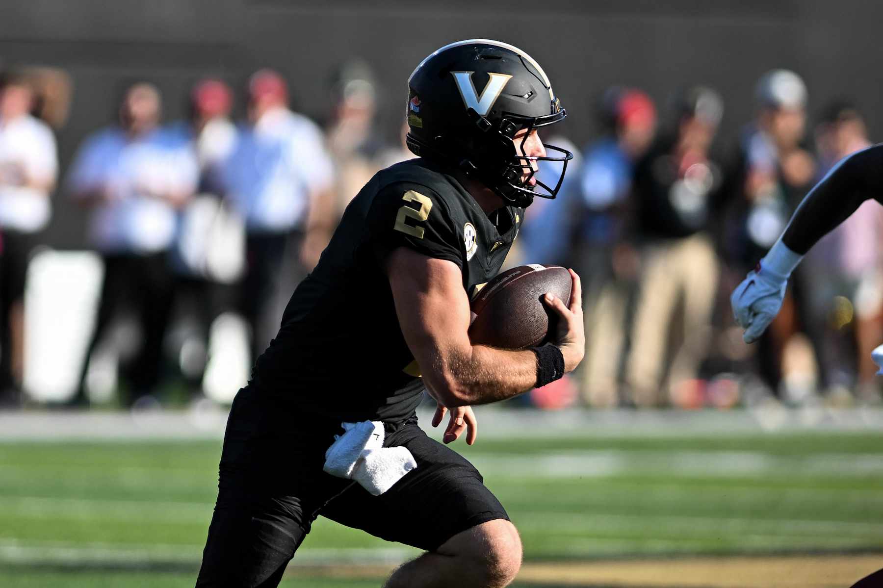 NASHVILLE, TENNESSEE - OCTOBER 5: Diego Pavia #2  Vanderbilt Commodores runs the ball the Alabama Crimson Tide in the first half at FirstBank Stadium on October 5, 2024 in Nashville, Tennessee. (Photo by Carly Mackler/Getty Images)