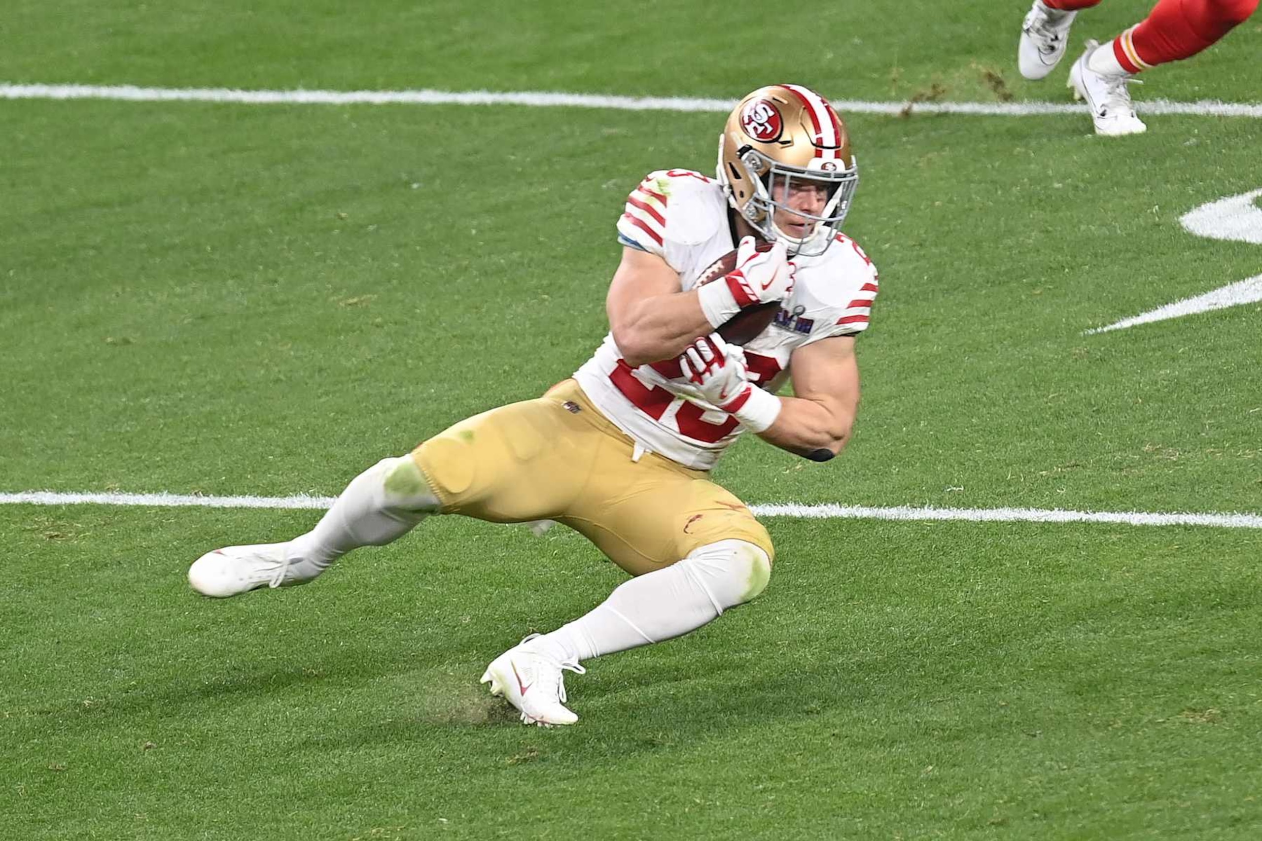 LAS VEGAS, NEVADA - FEBRUARY 11: Christian McCaffrey #23 of the San Francisco 49ers catches a pass against the Kansas City Chiefs in the second half during Super Bowl LVIII at Allegiant Stadium on February 11, 2024 in Las Vegas, Nevada. (Photo by Focus on Sport/Getty Images)