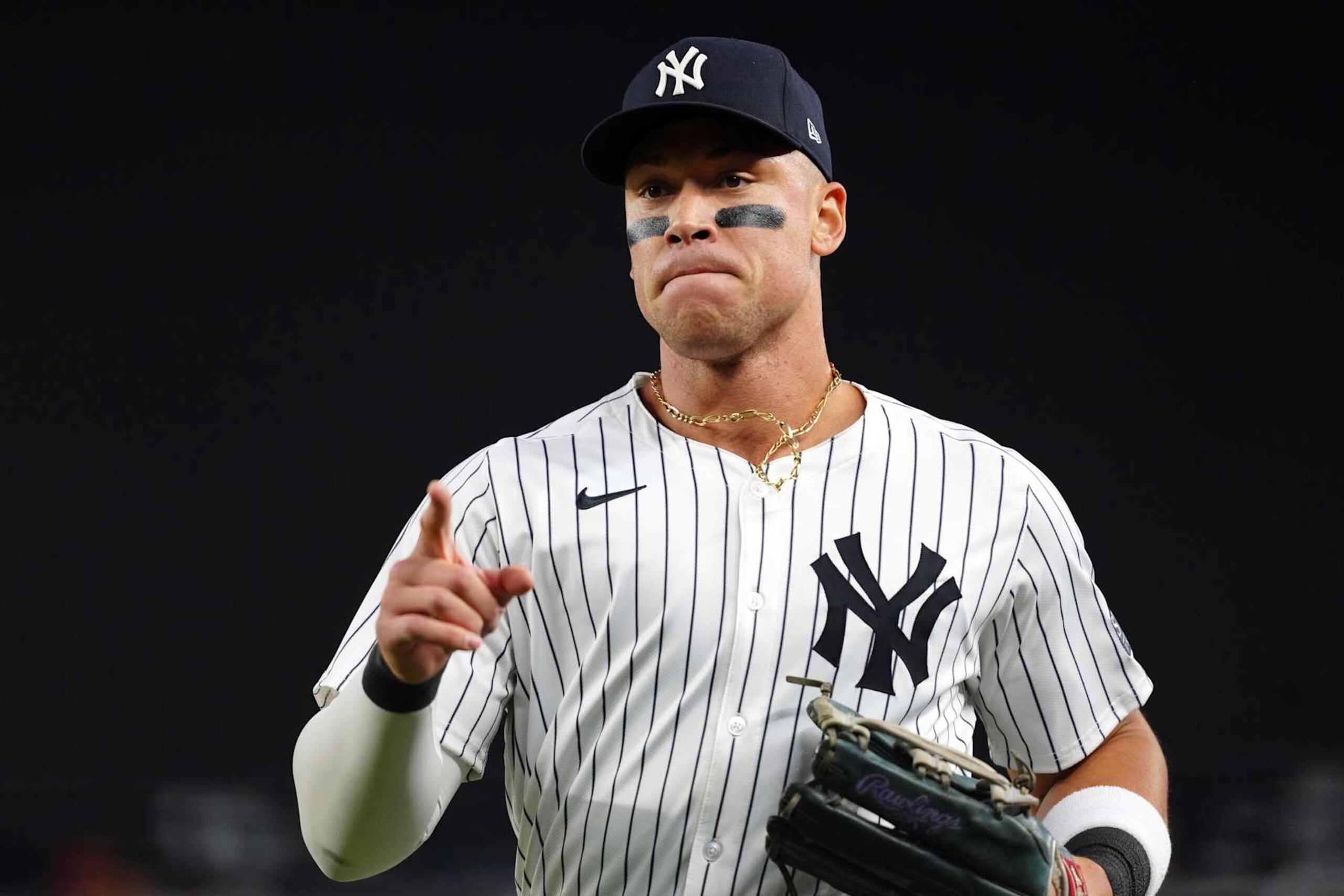 NEW YORK, NY - OCTOBER 05:  Aaron Judge #99 of he New York Yankees looks on during Game 1 of the Division Series presented by Booking.com between the Kansas City Royals and the New York Yankees at Yankee Stadium on Saturday, October 5, 2024 in New York, New York. (Photo by Mary DeCicco/MLB Photos via Getty Images)