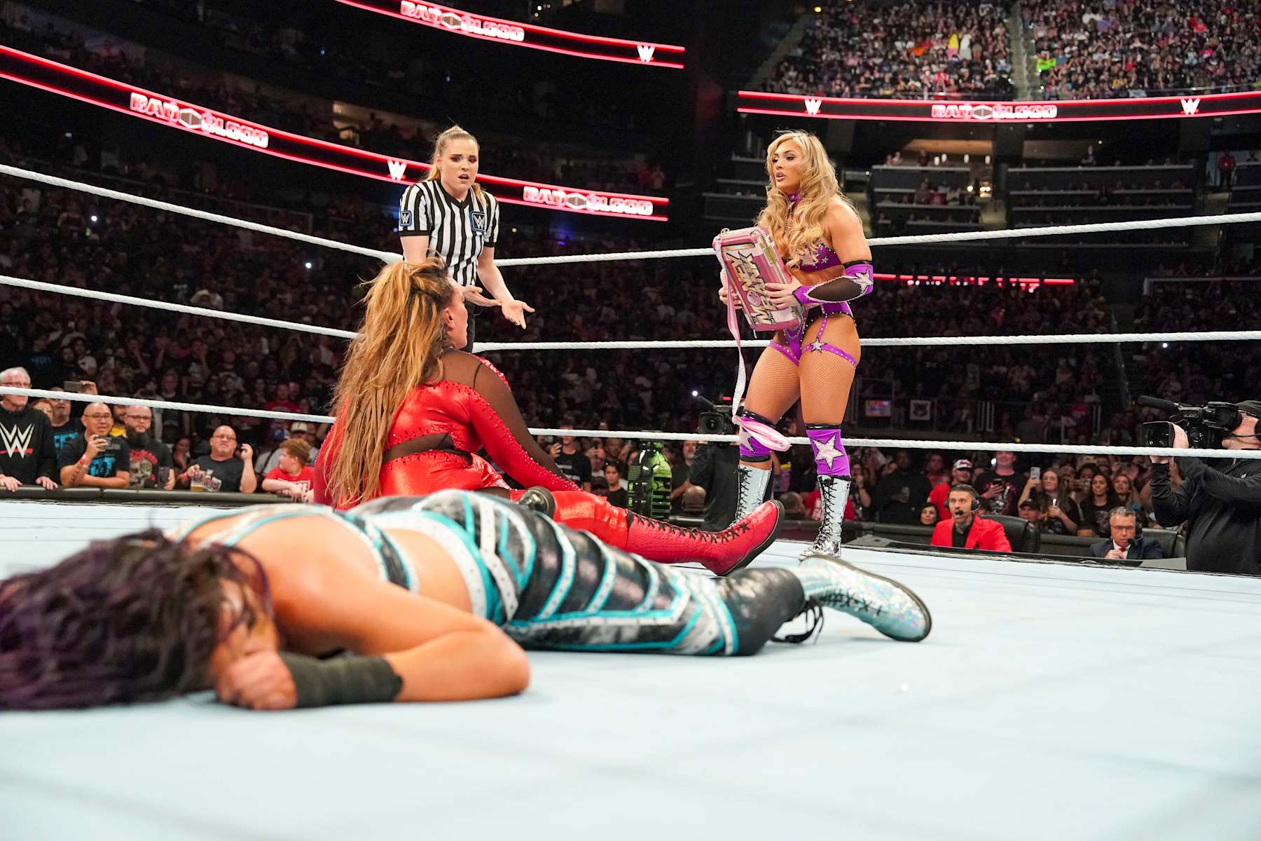 ATLANTA, GEORGIA - OCTOBER 05: Tiffany Stratton disrupts match to cash in Money in the Bank brief case during Bad Blood at State Farm Arena on October 5, 2024 in Atlanta, Georgia. (Photo by WWE/Getty Images)