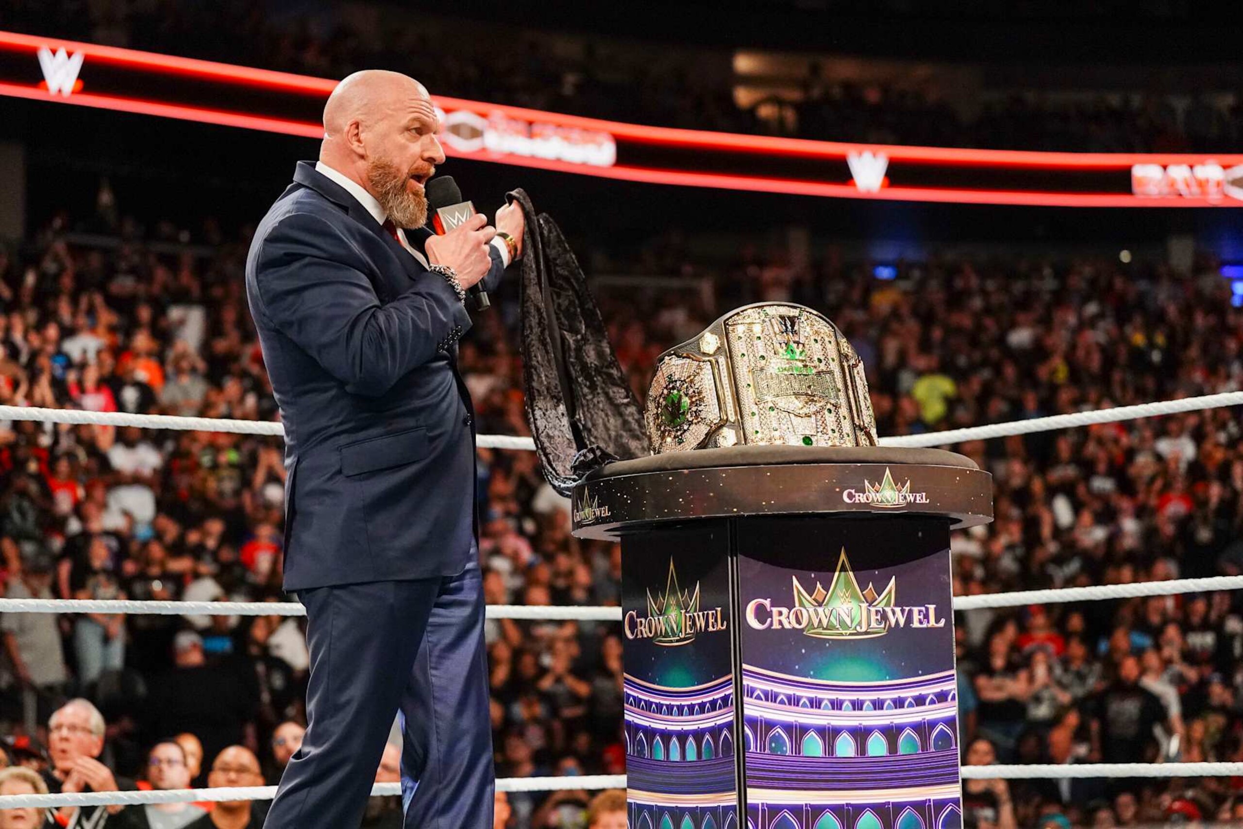 ATLANTA, GEORGIA - OCTOBER 5: Triple H presents the Crown Jewel title belt during Bad Blood at State Farm Arena on October 5, 2024 in Atlanta, Georgia.  (Photo by WWE/Getty Images)