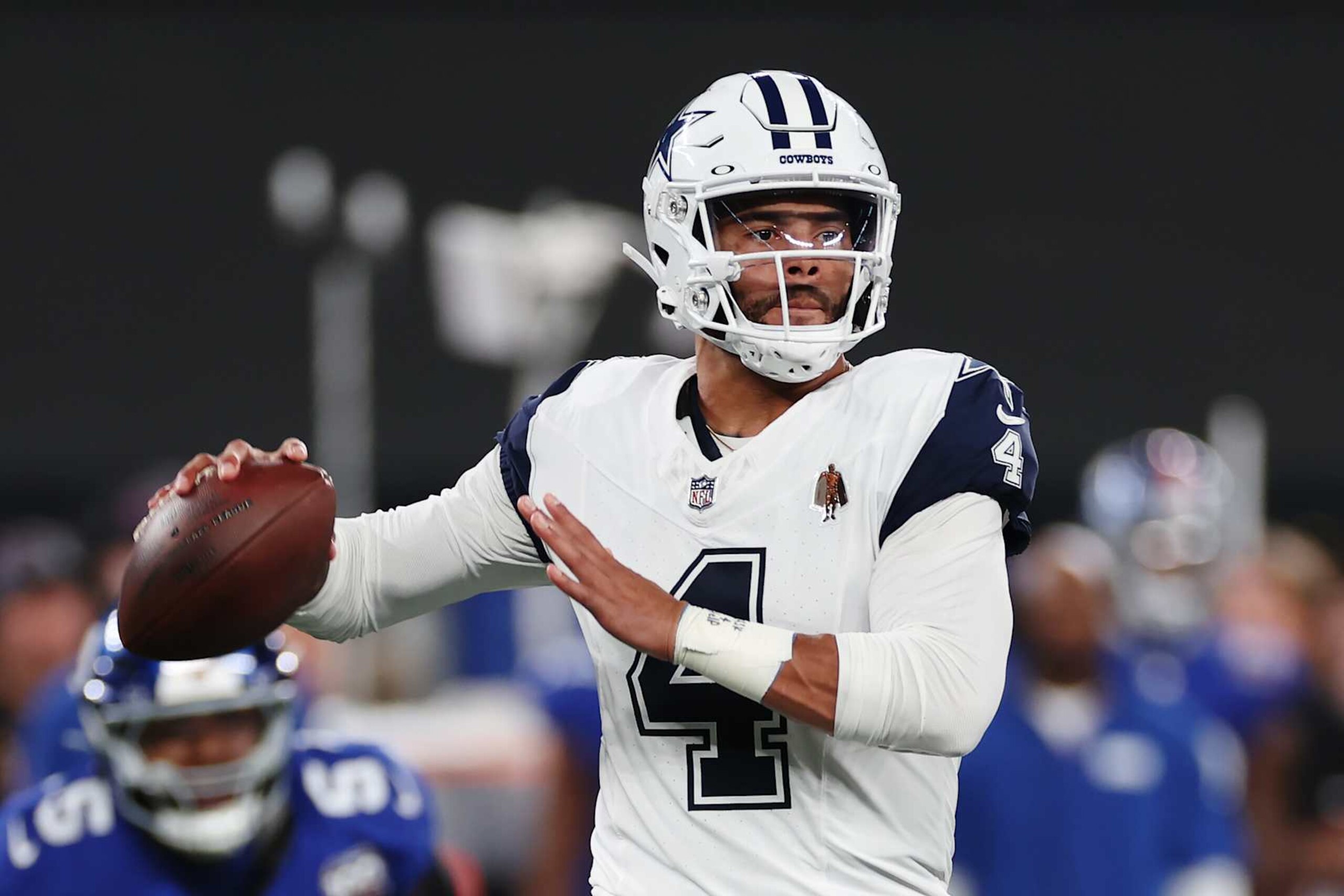EAST RUTHERFORD, NEW JERSEY - SEPTEMBER 26: Dak Prescott #4 of the Dallas Cowboys in action during the game against the New York Giants at MetLife Stadium on September 26, 2024 in East Rutherford, New Jersey. (Photo by Sarah Stier/Getty Images)