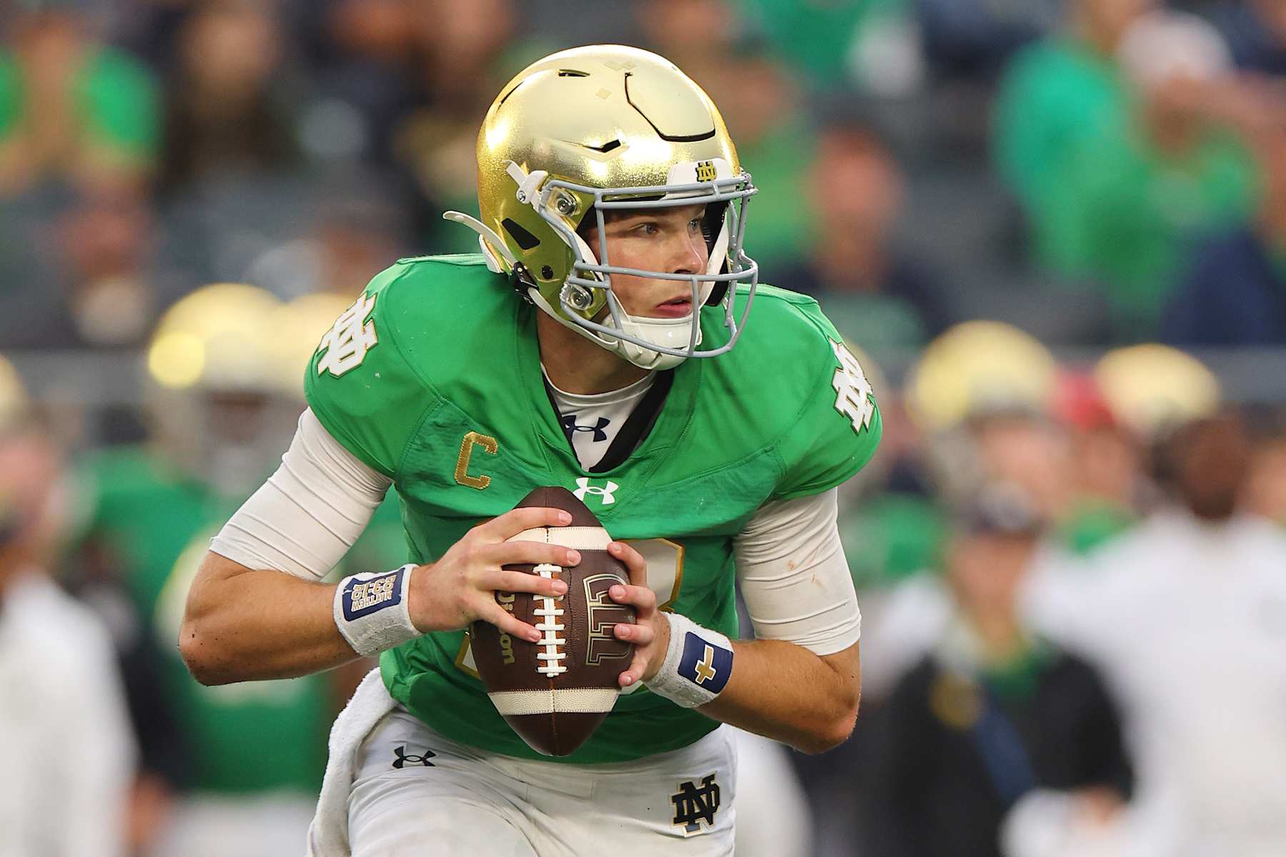 SOUTH BEND, INDIANA - SEPTEMBER 28: Riley Leonard #13 of the Notre Dame Fighting Irish scrambles with the ball against the Louisville Cardinals during the second half at Notre Dame Stadium on September 28, 2024 in South Bend, Indiana. (Photo by Michael Reaves/Getty Images) SOUTH BEND, INDIANA - SEPTEMBER 28: Riley Leonard #13 of the Notre Dame Fighting Irish scrambles with the ball against the Louisville Cardinals during the second half at Notre Dame Stadium on September 28, 2024 in South Bend, Indiana. (Photo by Michael Reaves/Getty Images)