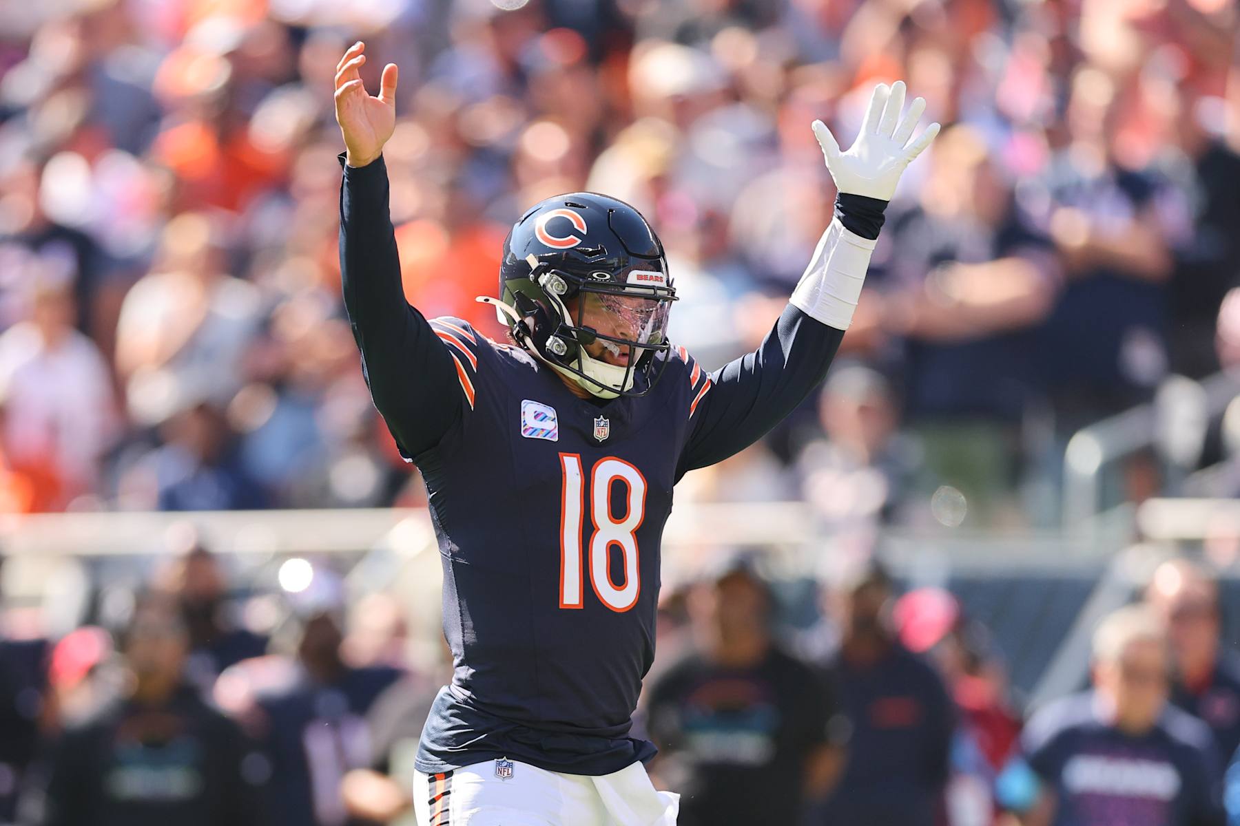CHICAGO, ILLINOIS - OCTOBER 06: Caleb Williams #18 of the Chicago Bears celebrates a touchdown against the Carolina Panthers during the second quarter at Soldier Field on October 06, 2024 in Chicago, Illinois. (Photo by Michael Reaves/Getty Images)