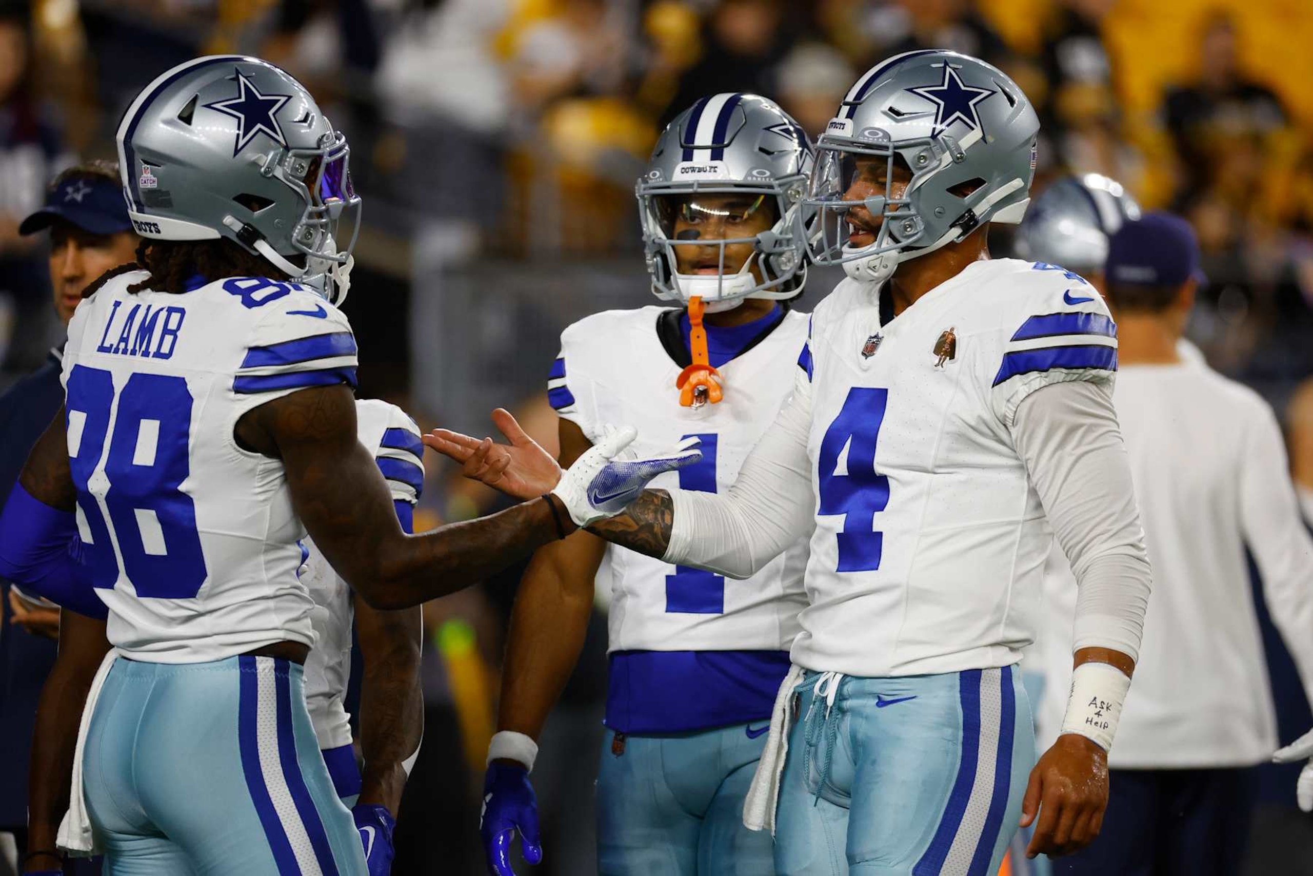 PITTSBURGH, PENNSYLVANIA - OCTOBER 06: CeeDee Lamb #88 and Dak Prescott #4 of the Dallas Cowboys shake hands before playing the Pittsburgh Steelers at Acrisure Stadium on October 06, 2024 in Pittsburgh, Pennsylvania. (Photo by Justin K. Aller/Getty Images)