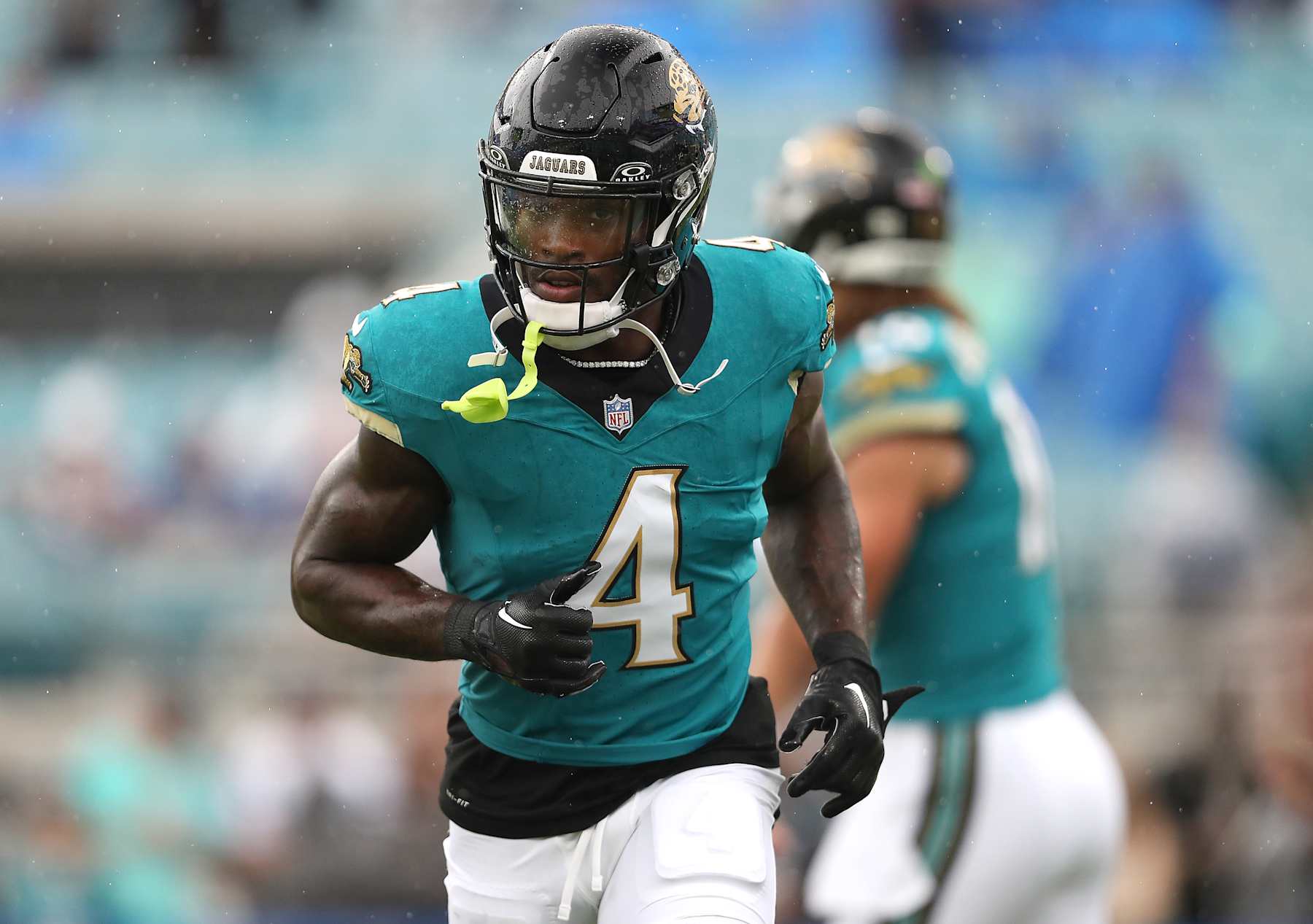 JACKSONVILLE, FLORIDA - OCTOBER 06: Tank Bigsby #4 of the Jacksonville Jaguars warms up prior to a game against the Indianapolis Colts at EverBank Stadium on October 06, 2024 in Jacksonville, Florida. (Photo by Courtney Culbreath/Getty Images)