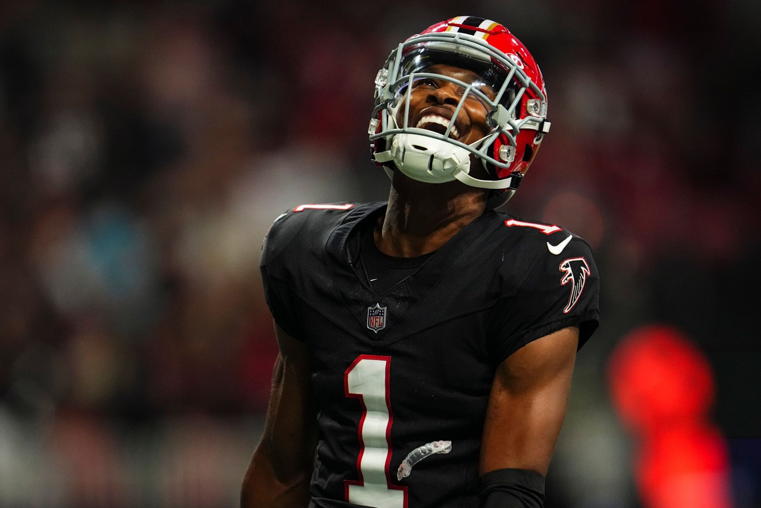 ATLANTA, GA - OCTOBER 03: Darnell Mooney #1 of the Atlanta Falcons celebrates during an NFL football game against the Tampa Bay Buccaneers at Mercedes-Benz Stadium on October 3, 2024 in Atlanta, Georgia. (Photo by Cooper Neill/Getty Images)