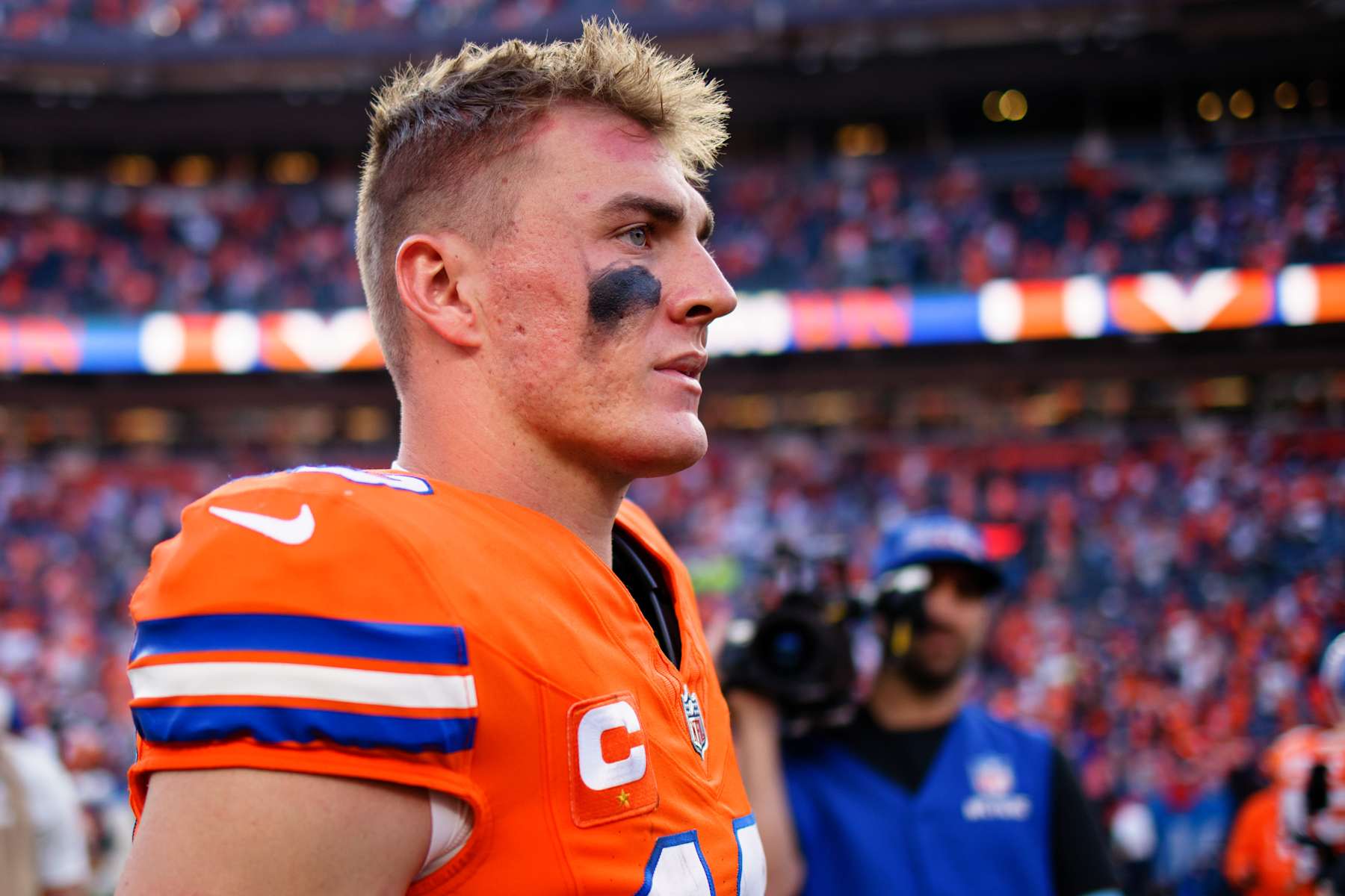 DENVER, CO - OCTOBER 6:  Quarterback Bo Nix #10 of the Denver Broncos walks on the field after defeating the Las Vegas Raiders 34-18 at Empower Field at Mile High on October 6, 2024 in Denver, Colorado. (Photo by Justin Edmonds/Getty Images)