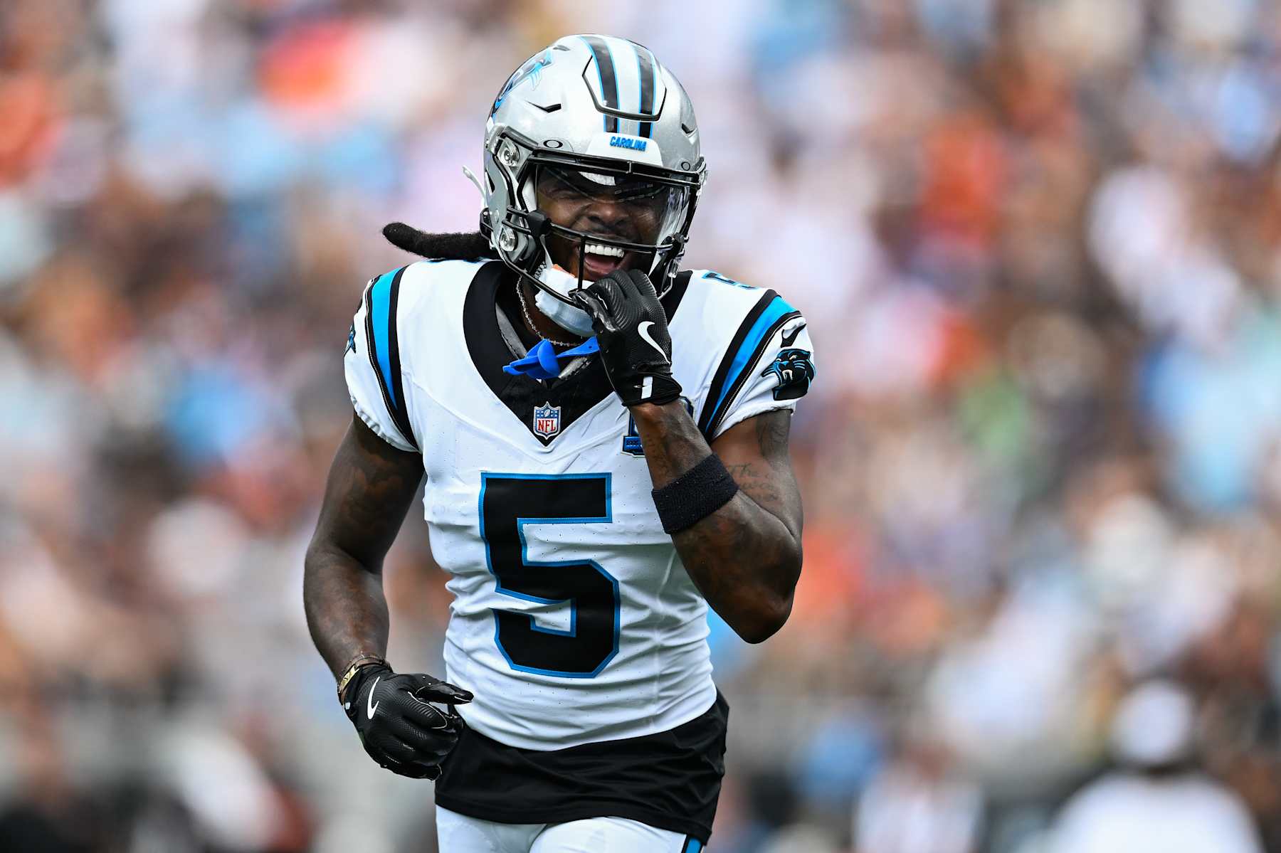 CHARLOTTE, NORTH CAROLINA - SEPTEMBER 29: Diontae Johnson (5) of the Carolina Panthers smiles during the first quarter of his game against the Cincinnati Bengals at Bank of America Stadium on September 29, 2024 in Charlotte, North Carolina. (Photo by Matt Kelley/Getty Images)
