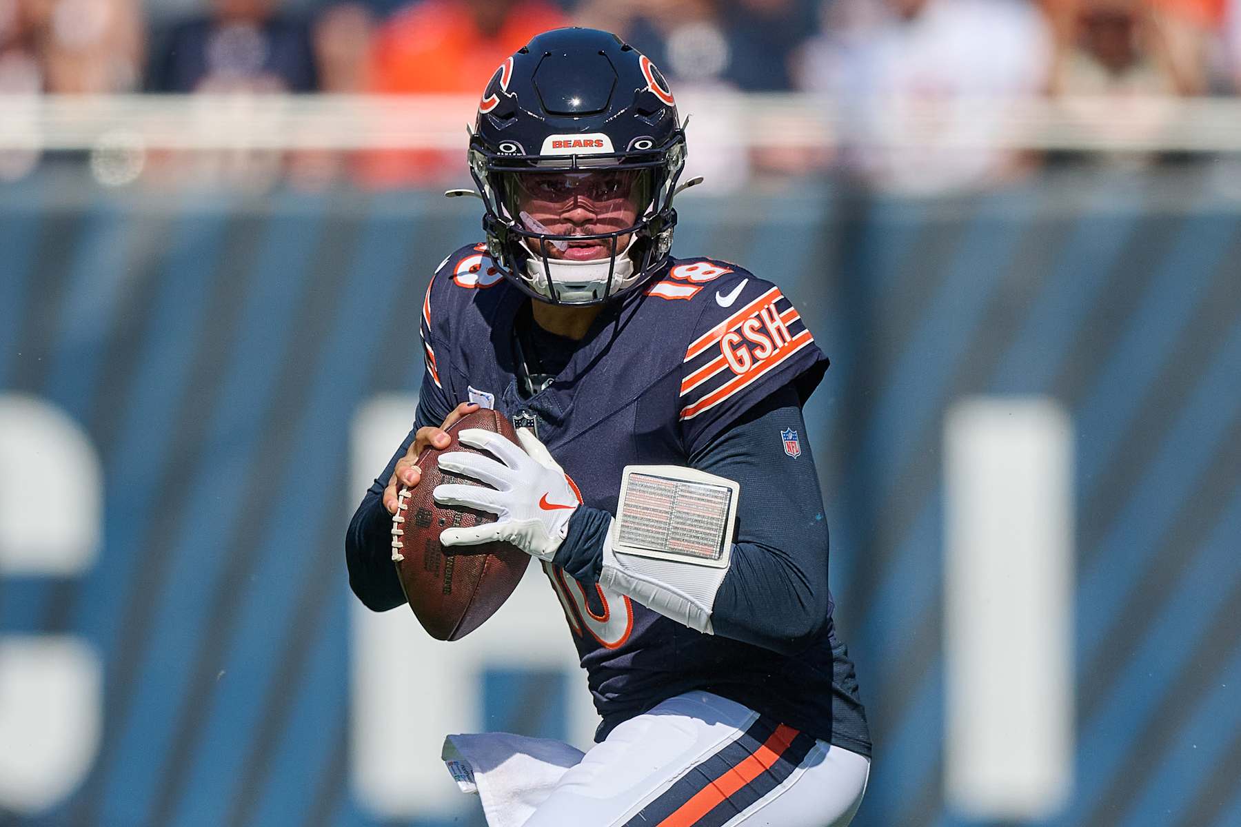 CHICAGO, IL - OCTOBER 06: Chicago Bears quarterback Caleb Williams (18) looks to throw the football in action during a game between the Chicago Bears and the Carolina Panthers on October 06, 2024 at Soldier Field, in Chicago, IL. (Photo by Robin Alam/Icon Sportswire via Getty Images)