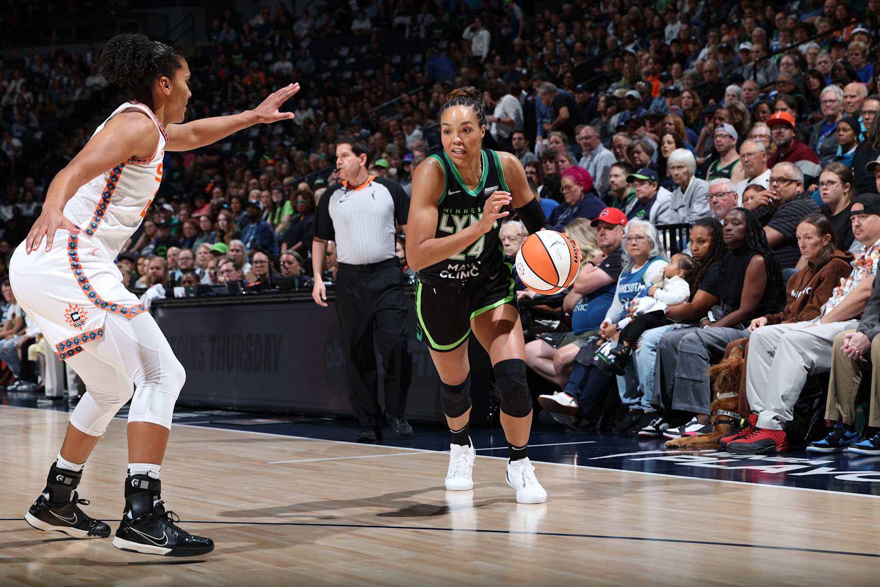 MINNEAPOLIS, MN - OCTOBER 7: Napheesa Collier #24 of the Minnesota Lynx drives to the basket during the game against the Connecticut Sun during Round Two Game Five of the 2024 WNBA Playoffs on October 7, 2024 at Target Center in Minneapolis, Minnesota. NOTE TO USER: User expressly acknowledges and agrees that, by downloading and or using this Photograph, user is consenting to the terms and conditions of the Getty Images License Agreement. Mandatory Copyright Notice: Copyright 2024 NBAE (Photo by David Sherman/NBAE via Getty Images)