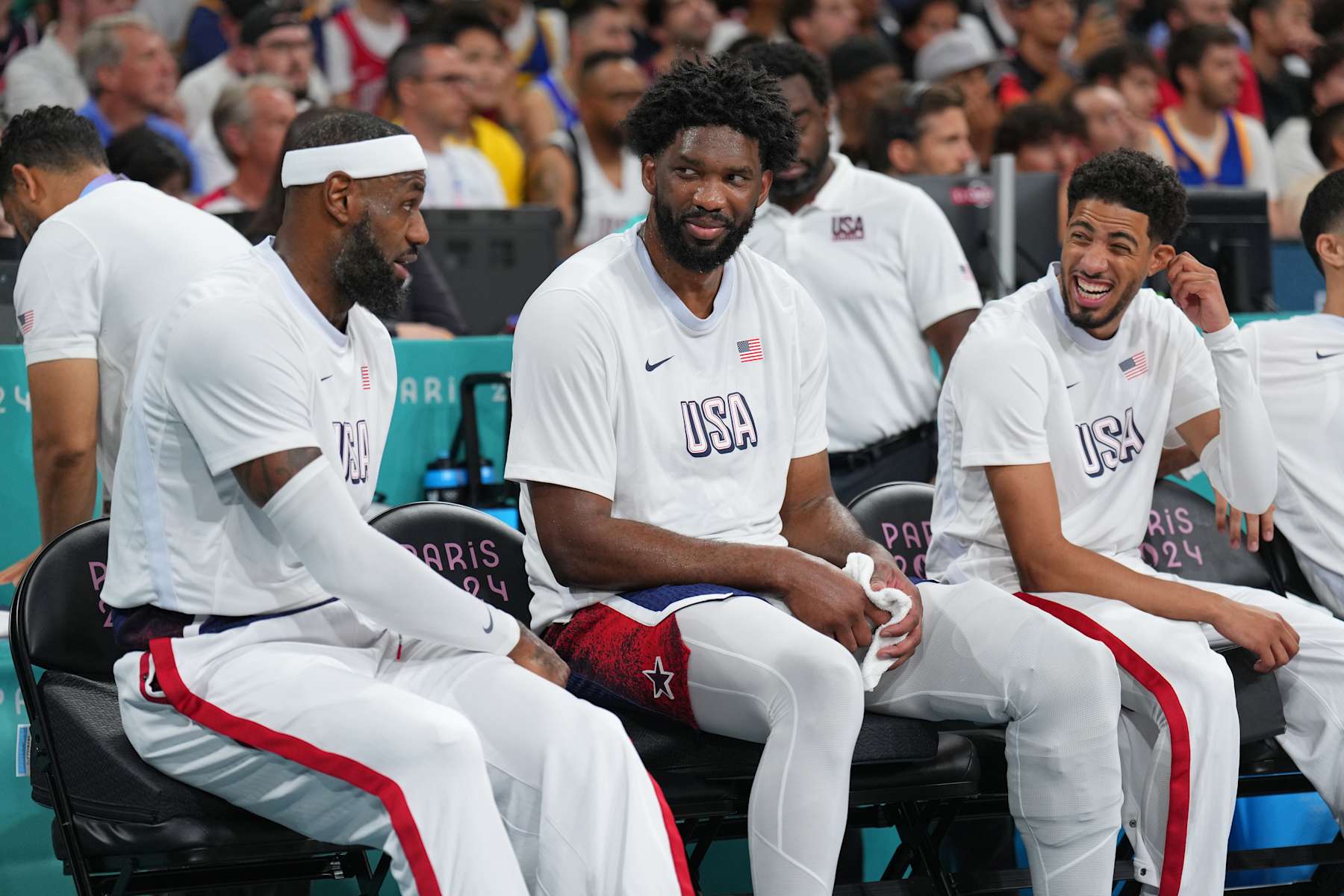 LILLE, FRANCE - AUGUST 3:   LeBron James #6, Joel Embiid #11 and Tyrese Haliburton #9 of the USA Men's National Team looks on during the game at the  Stade Pierre Mauroy on August 3, 2024 in Lille, France. NOTE TO USER: User expressly acknowledges and agrees that, by downloading and/or using this photograph, user is consenting to the terms and conditions of the Getty Images License Agreement. Mandatory Copyright Notice: Copyright 2024 NBAE (Photo by Jesse D. Garrabrant/NBAE via Getty Images)