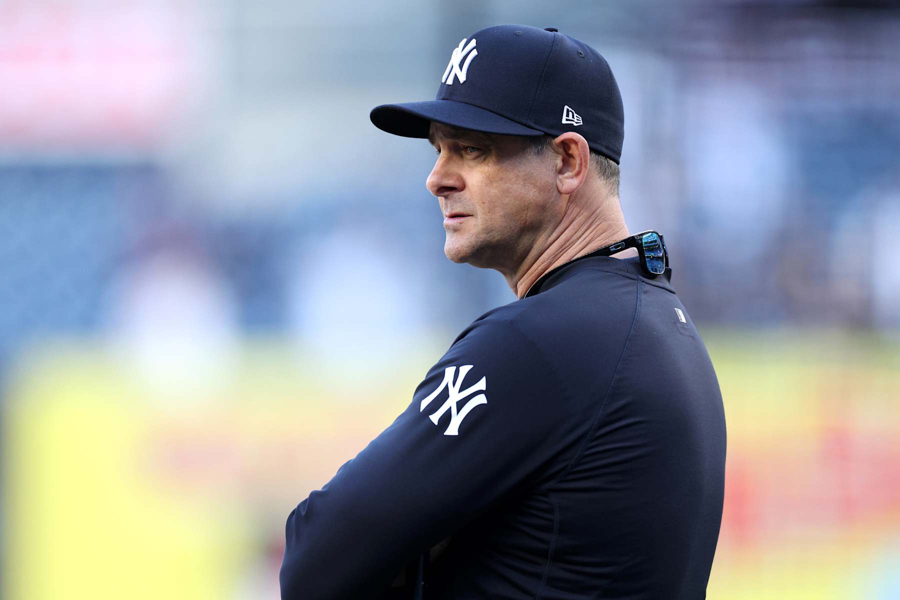 NEW YORK, NEW YORK - OCTOBER 07: Manager Aaron Boone #17 of the New York Yankees looks on during batting practice prior to Game Two of the Division Series against the Kansas City Royals at Yankee Stadium on October 07, 2024 in New York City. (Photo by Elsa/Getty Images)