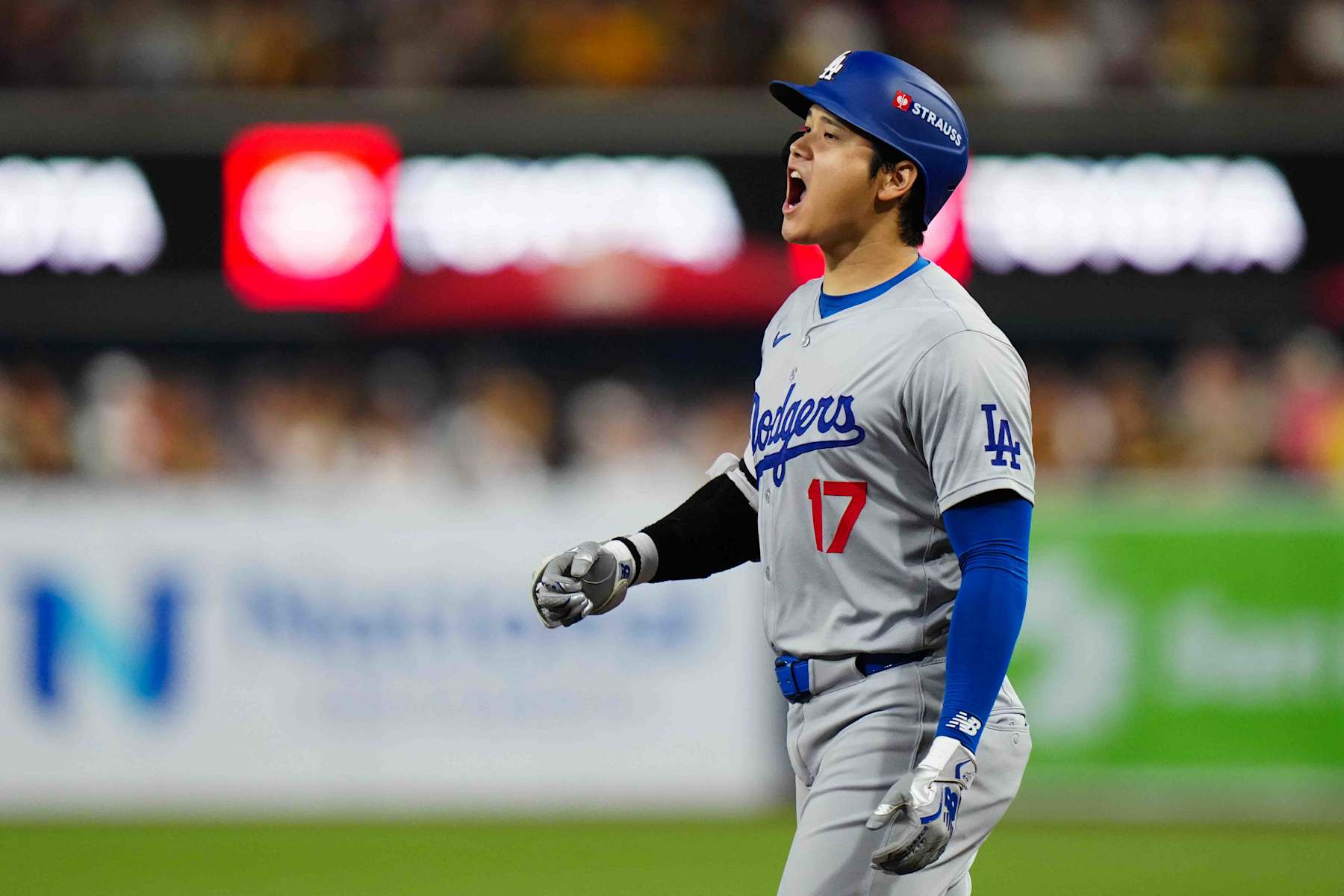 SAN DIEGO, CA - OCTOBER 09:   Shohei Ohtani #17 of the Los Angeles Dodgers reacts after hitting a one RBI single in the second inning during Game 4 of the Division Series presented by Booking.com between the Los Angeles Dodgers and the San Diego Padres at Petco Park on Wednesday, October 9, 2024 in San Diego, California. (Photo by Daniel Shirey/MLB Photos via Getty Images)