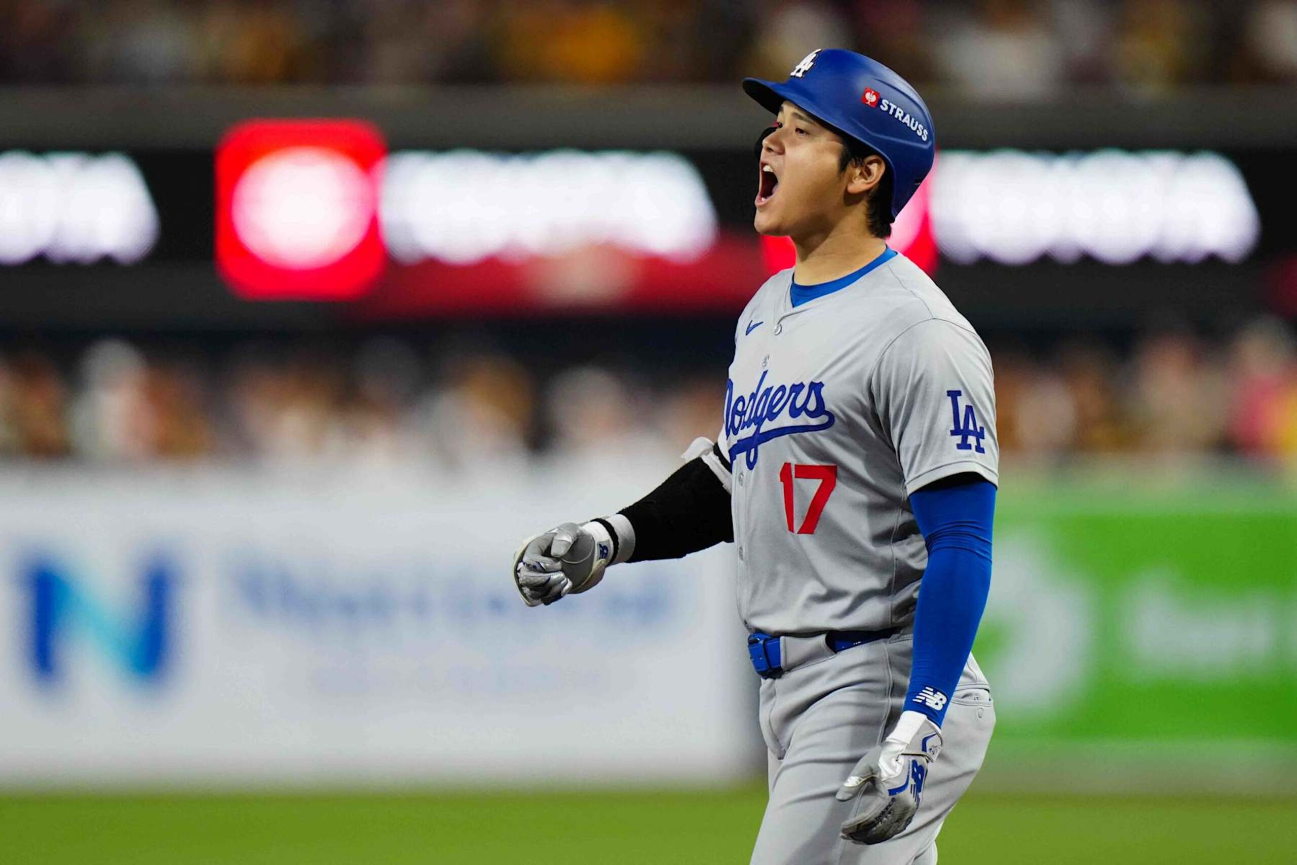 SAN DIEGO, CA - OCTOBER 09: Shohei Ohtani #17 of the Los Angeles Dodgers reacts after hitting a one RBI single in the second inning during Game 4 of the Division Series presented by Booking.com between the Los Angeles Dodgers and the San Diego Padres at Petco Park on Wednesday, October 9, 2024 in San Diego, California. (Photo by Daniel Shirey/MLB Photos via Getty Images) SAN DIEGO, CA - OCTOBER 09: Shohei Ohtani #17 of the Los Angeles Dodgers reacts after hitting a one RBI single in the second inning during Game 4 of the Division Series presented by Booking.com between the Los Angeles Dodgers and the San Diego Padres at Petco Park on Wednesday, October 9, 2024 in San Diego, California. (Photo by Daniel Shirey/MLB Photos via Getty Images)