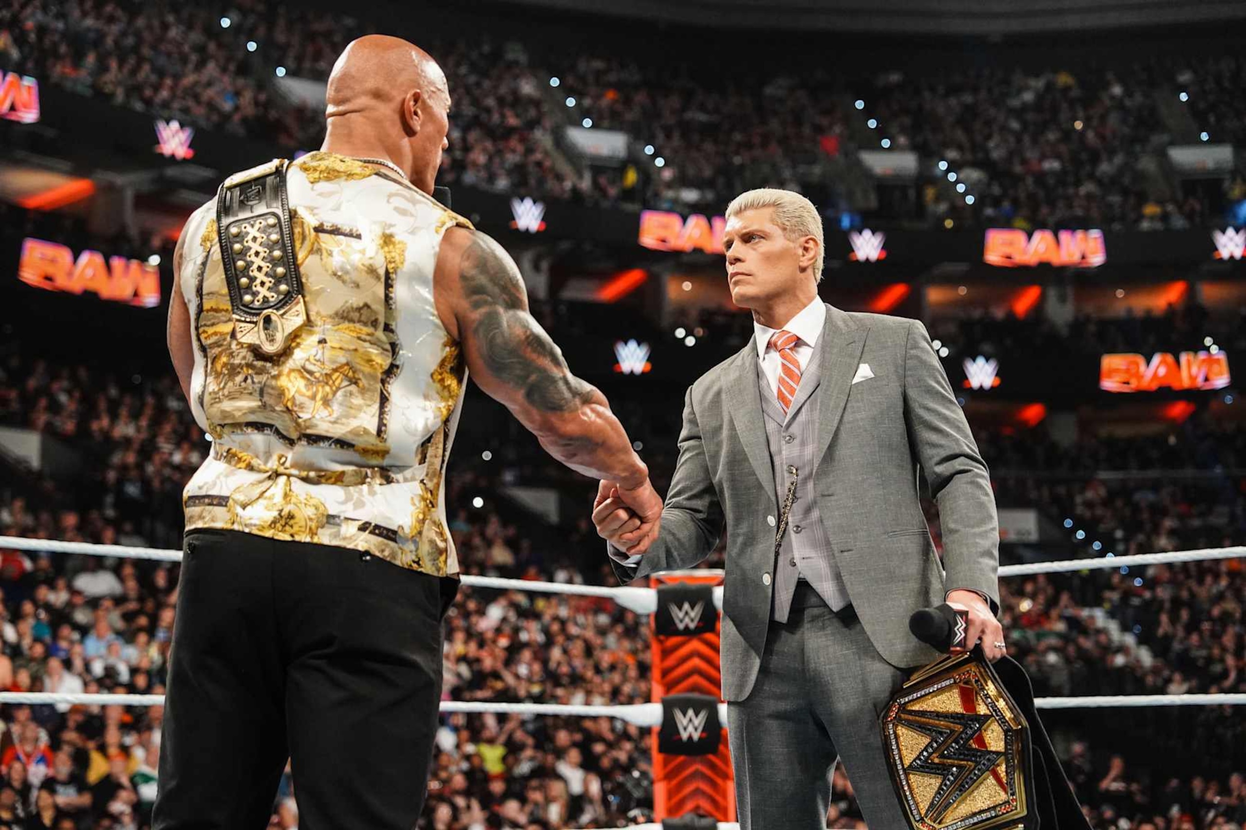 PHILADELPHIA, PENNSYLVANIA - APRIL 08: Dwayne "The Rock" Johnson stands in ring with Cody Rhodes at the Wells Fargo Center on April 8, 2024 in Philadelphia, Pennsylvania. (Photo by WWE/Getty Images) PHILADELPHIA, PENNSYLVANIA - APRIL 08: Dwayne "The Rock" Johnson stands in ring with Cody Rhodes at the Wells Fargo Center on April 8, 2024 in Philadelphia, Pennsylvania. (Photo by WWE/Getty Images)