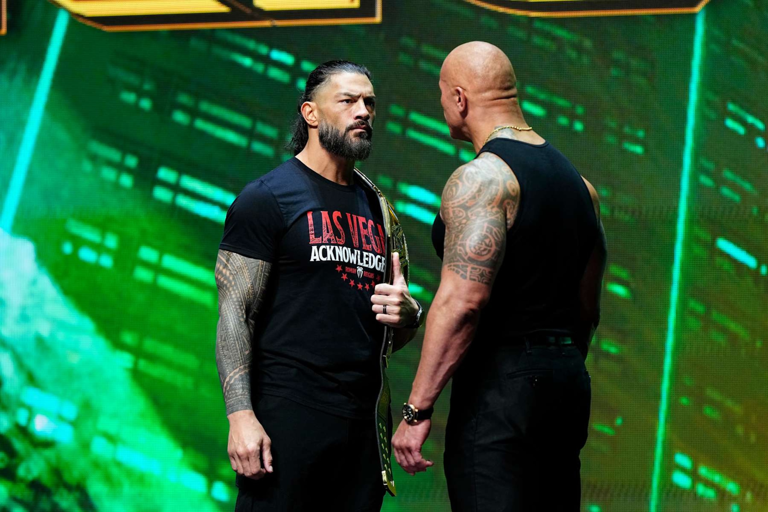 LAS VEGAS, NV - FEBRUARY 08: Dwayne "The Rock" Johnson and Roman Reigns during the WWE Wrestlemania XL Kickoff on February 08, 2024, at T-Mobile Arena in Las Vegas, NV. (Photo by Louis Grasse/PXimages/Icon Sportswire via Getty Images) LAS VEGAS, NV - FEBRUARY 08: Dwayne "The Rock" Johnson and Roman Reigns during the WWE Wrestlemania XL Kickoff on February 08, 2024, at T-Mobile Arena in Las Vegas, NV. (Photo by Louis Grasse/PXimages/Icon Sportswire via Getty Images)