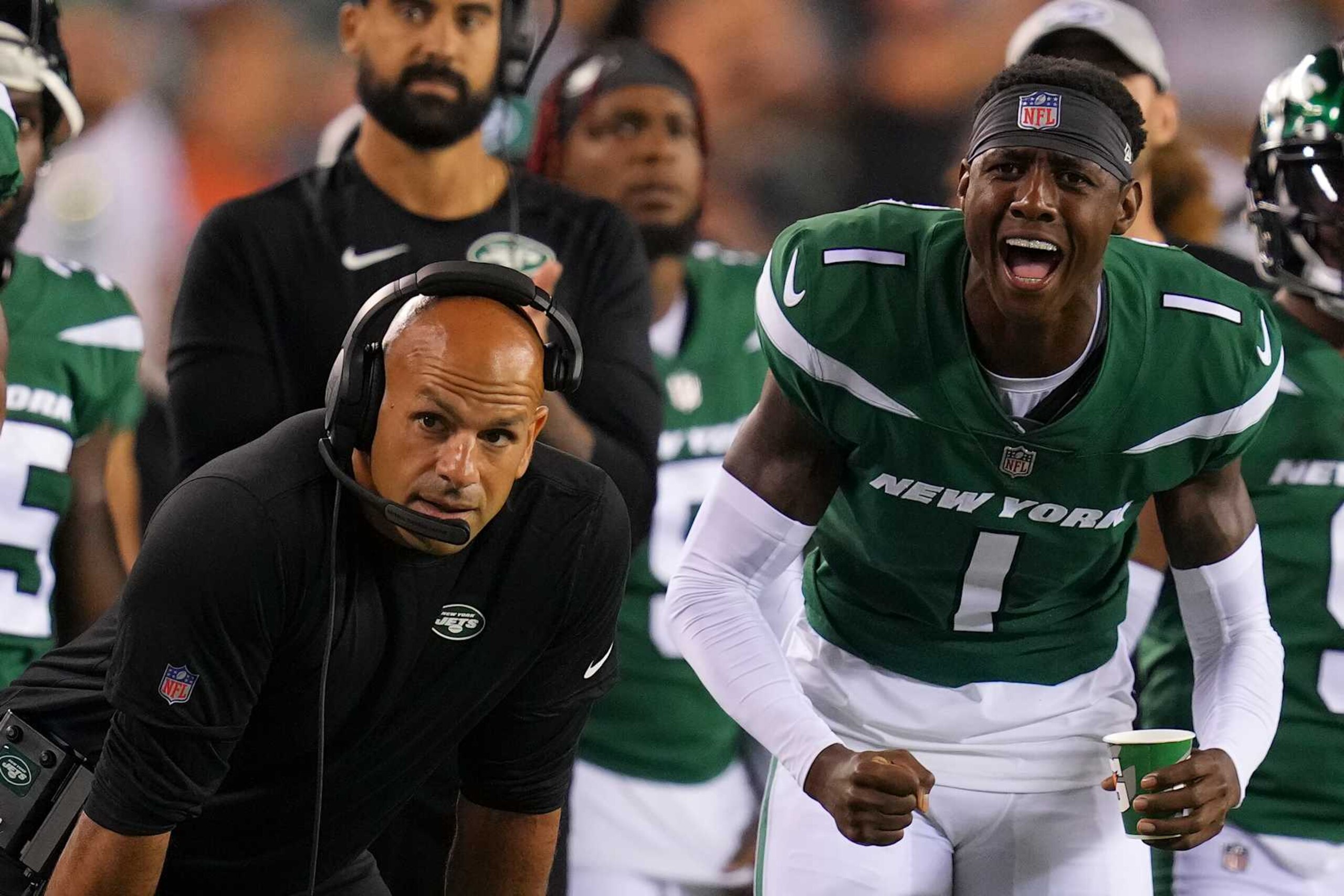 PHILADELPHIA, PA - AUGUST 12: Head coach Robert Saleh of the New York Jets looks on as Sauce Gardner #1 reacts behind him against the Philadelphia Eagles in the second half of the preseason game at Lincoln Financial Field on August 12, 2022 in Philadelphia, Pennsylvania. The Jets defeated the Eagles 24-21. (Photo by Mitchell Leff/Getty Images)
