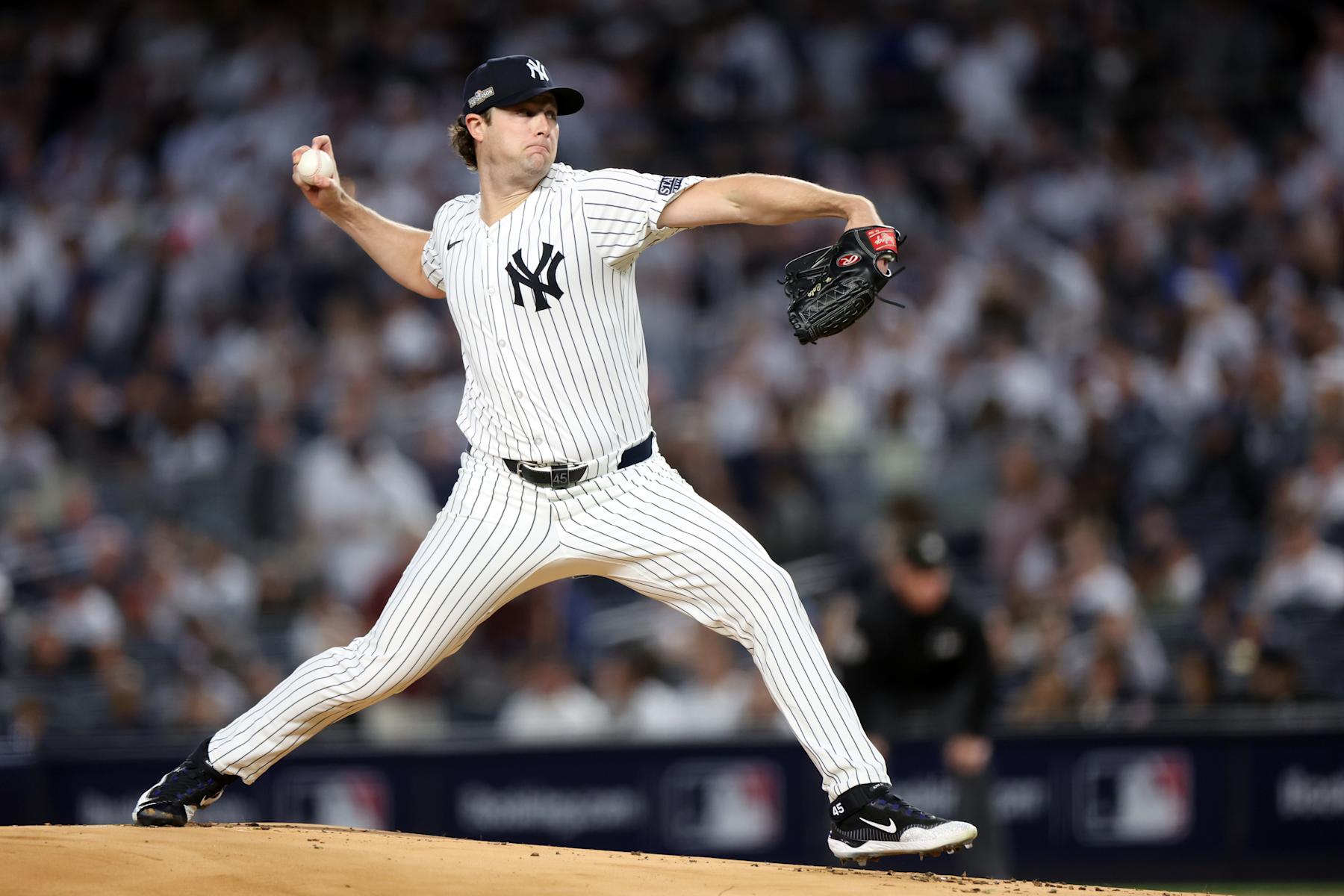 NEW YORK, NEW YORK - OCTOBER 05:  Gerrit Cole #45 of the New York Yankees delivers the pitch against the Kansas City Royals during the first inning in Game One of the Division Series at Yankee Stadium on October 05, 2024 in New York City.  (Photo by Luke Hales/Getty Images)