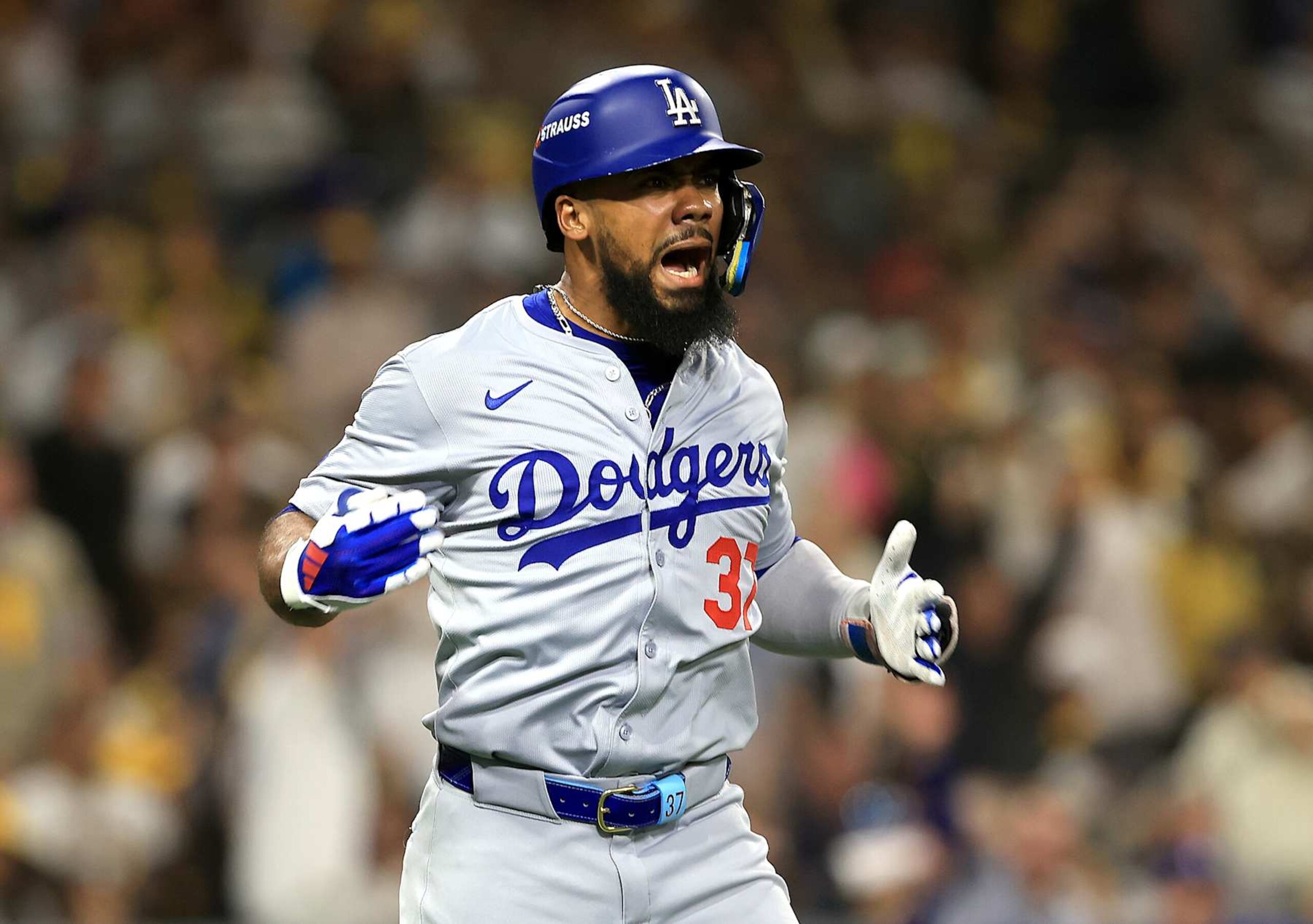 SAN DIEGO, CALIFORNIA - OCTOBER 08: Teoscar Hernández #37 of the Los Angeles Dodgers celebrates after hitting a grand slam in the third inning against the San Diego Padres during Game Three of the Division Series at Petco Park on October 08, 2024 in San Diego, California. (Photo by Sean M. Haffey/Getty Images)