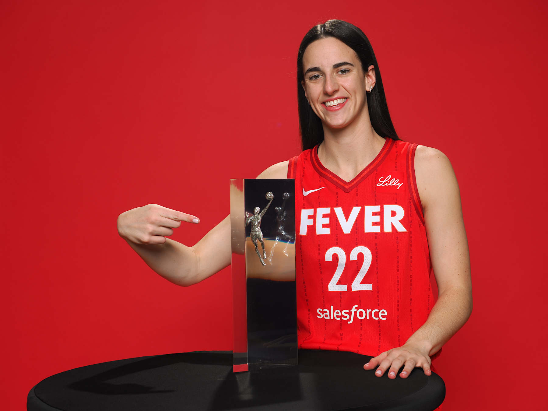 INDIANAPOLIS, IN - OCTOBER 04: Caitlin Clark #22 of the Indiana Fever poses for a portrait after being named 2024 WNBA Rookie of the Year on October 4, 2024 at Gainbridge Fieldhouse in Indianapolis, Indiana. NOTE TO USER: User expressly acknowledges and agrees that, by downloading and or using this Photograph, user is consenting to the terms and conditions of the Getty Images License Agreement. Mandatory Copyright Notice: Copyright 2024 NBAE (Photo by Ron Hoskins/NBAE via Getty Images)