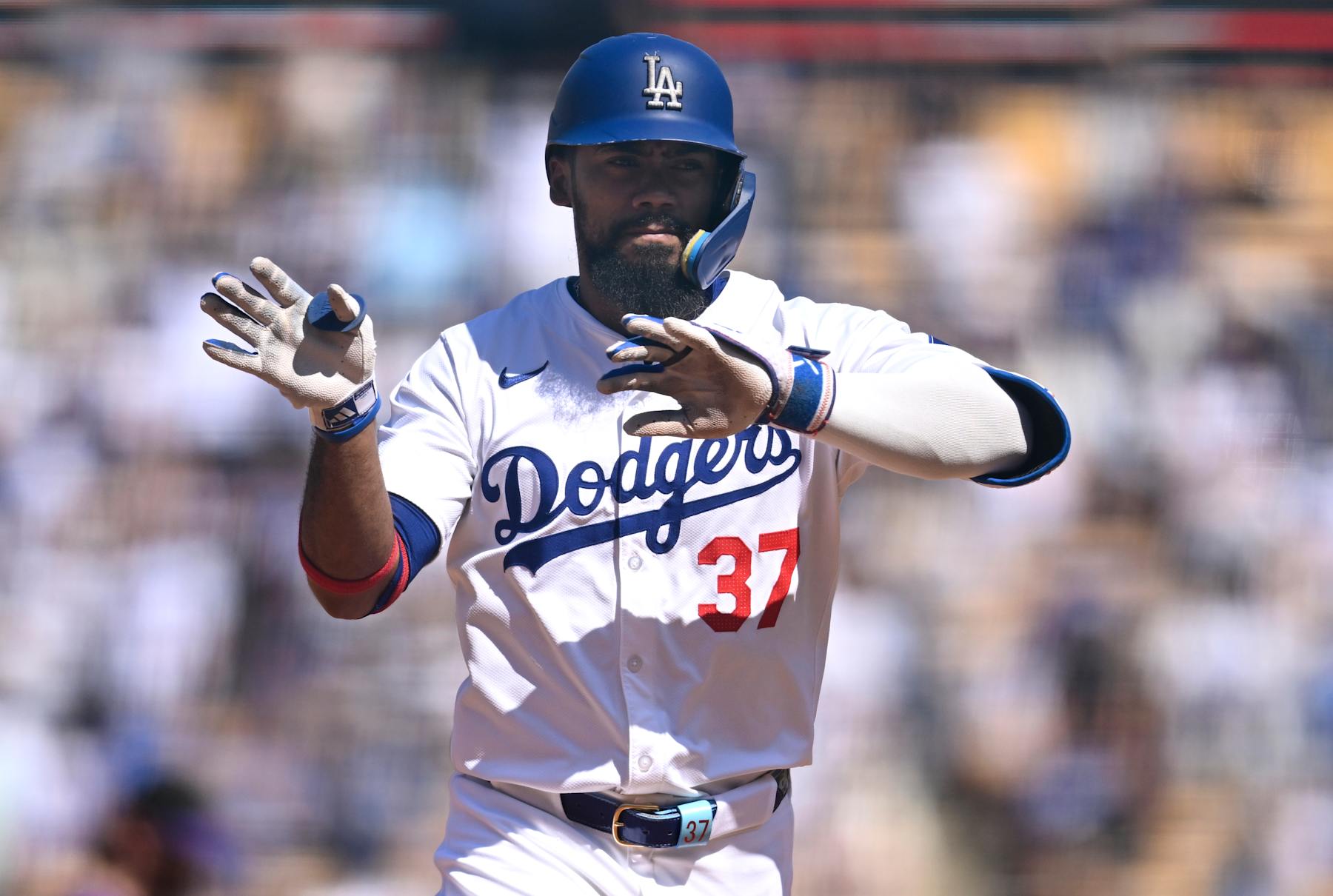 LOS ANGELES, CALIFORNIA - SEPTEMBER 22: Teoscar Hernández #37 of the Los Angeles Dodgers celebrates after hitting a home run in the fourth inning against the Colorado Rockies at Dodger Stadium on September 22, 2024 in Los Angeles, California. (Photo by John McCoy/Getty Images)