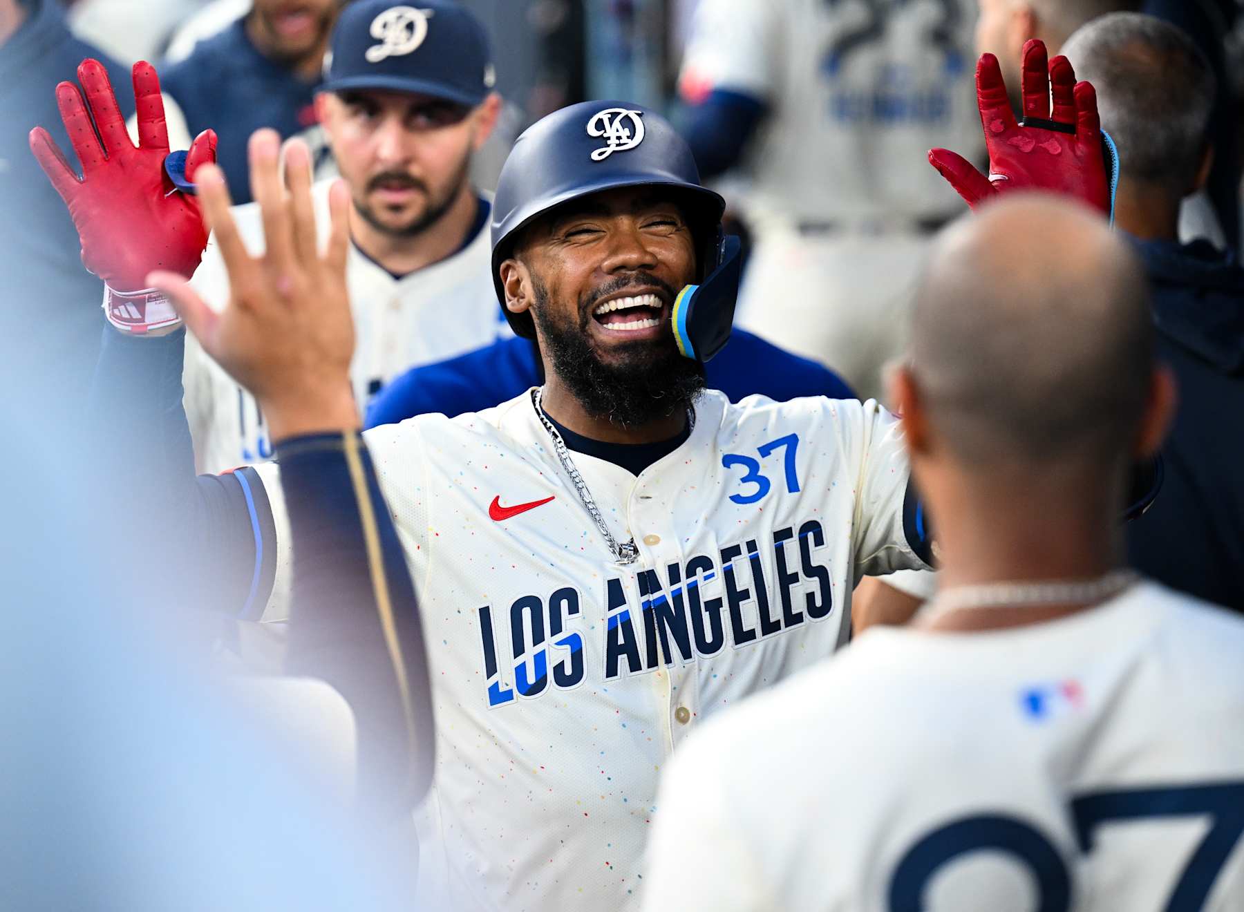 LOS ANGELES, CALIFORNIA - AUGUST 10: Teoscar Hernandez #37 of Los Angeles Dodgers celebrates with teamates after hitting a solo homerun in the bottom of the fifth inning during the regular season game against the Pittsburgh Pirates at Dodger Stadium on August 10, 2024 in Los Angeles, California. (Photo by Gene Wang/Getty Images)