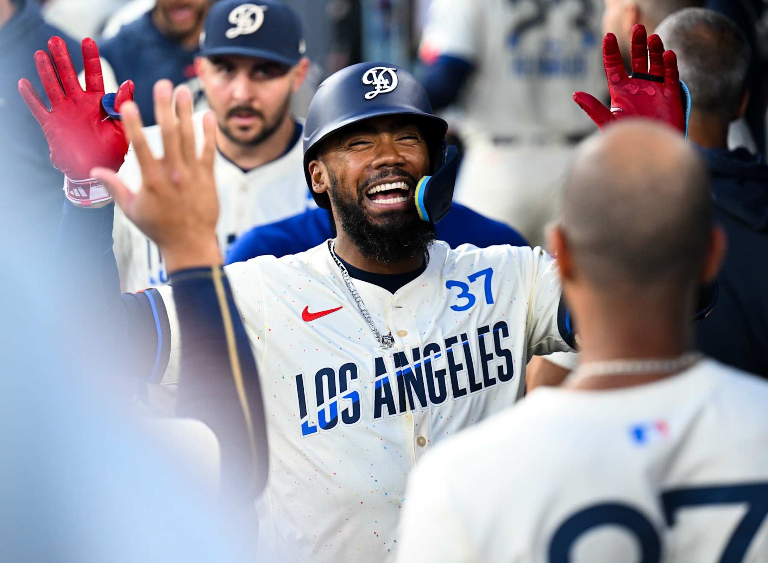 LOS ANGELES, CALIFORNIA - AUGUST 10: Teoscar Hernandez #37 of Los Angeles Dodgers celebrates with teamates after hitting a solo homerun in the bottom of the fifth inning during the regular season game against the Pittsburgh Pirates at Dodger Stadium on August 10, 2024 in Los Angeles, California. (Photo by Gene Wang/Getty Images)