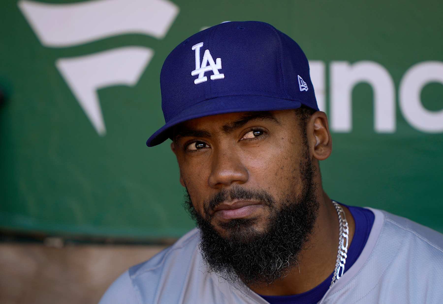 OAKLAND, CALIFORNIA - AUGUST 03: Teoscar Hernández #37 of the Los Angeles Dodgers looks on from the dugout prior to the start of the game against the Oakland Athletics at the Oakland Coliseum on August 3, 2024 in Oakland, California. (Photo by Thearon W. Henderson/Getty Images)