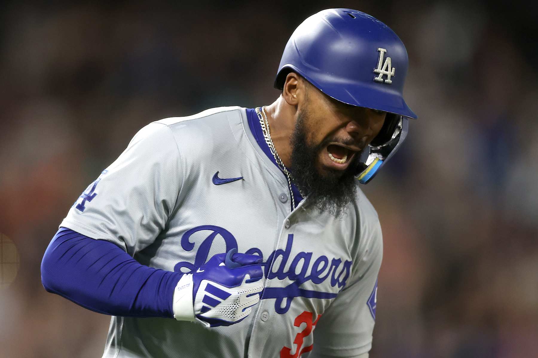 DENVER, COLORADO - JUNE 18: Teoscar Hernandez #37 of the Los Angeles Dodgers celebrates after hitting a three RBI home run to take the lead against the Colorado Rockies in the ninth inning at Coors Field on June 18, 2024 in Denver, Colorado. (Photo by Matthew Stockman/Getty Images)