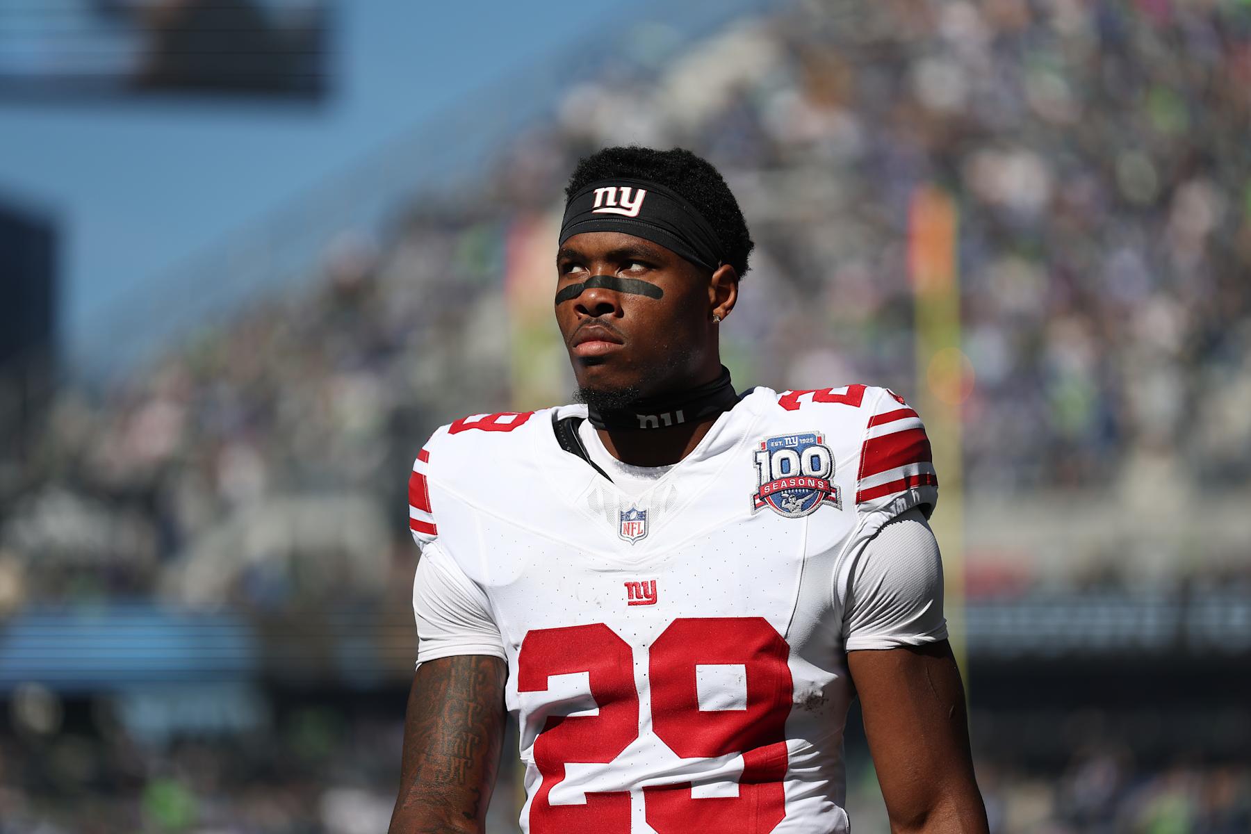 SEATTLE, WASHINGTON - OCTOBER 06: Tyrone Tracy Jr. #29 of the New York Giants looks on prior to a game against the Seattle Seahawks at Lumen Field on October 06, 2024 in Seattle, Washington. (Photo by Steph Chambers/Getty Images)