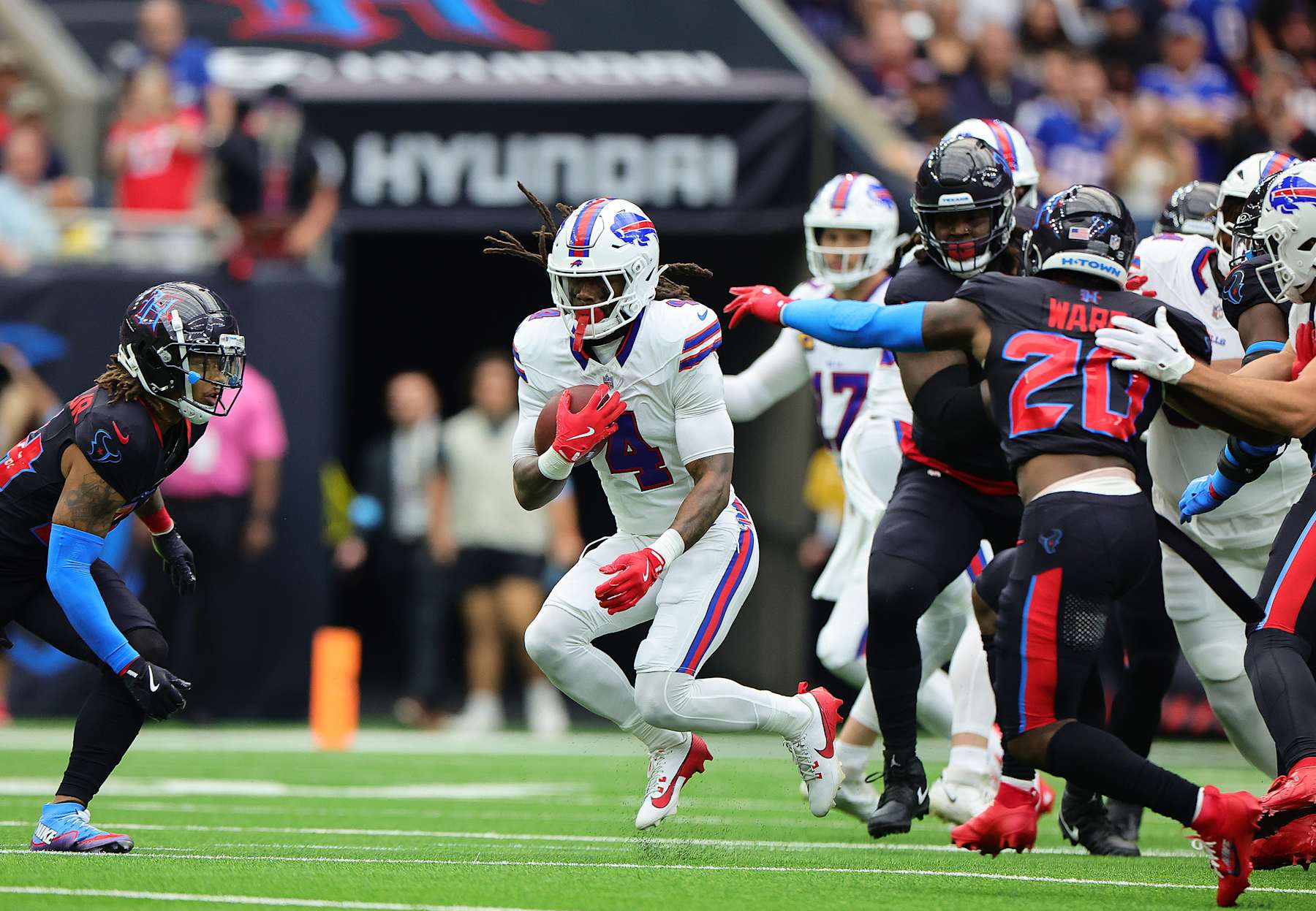HOUSTON, TEXAS - OCTOBER 06: James Cook #4 of the Buffalo Bills runs with the ball during the first quarter against the Houston Texans at NRG Stadium on October 06, 2024 in Houston, Texas. (Photo by Alex Slitz/Getty Images)