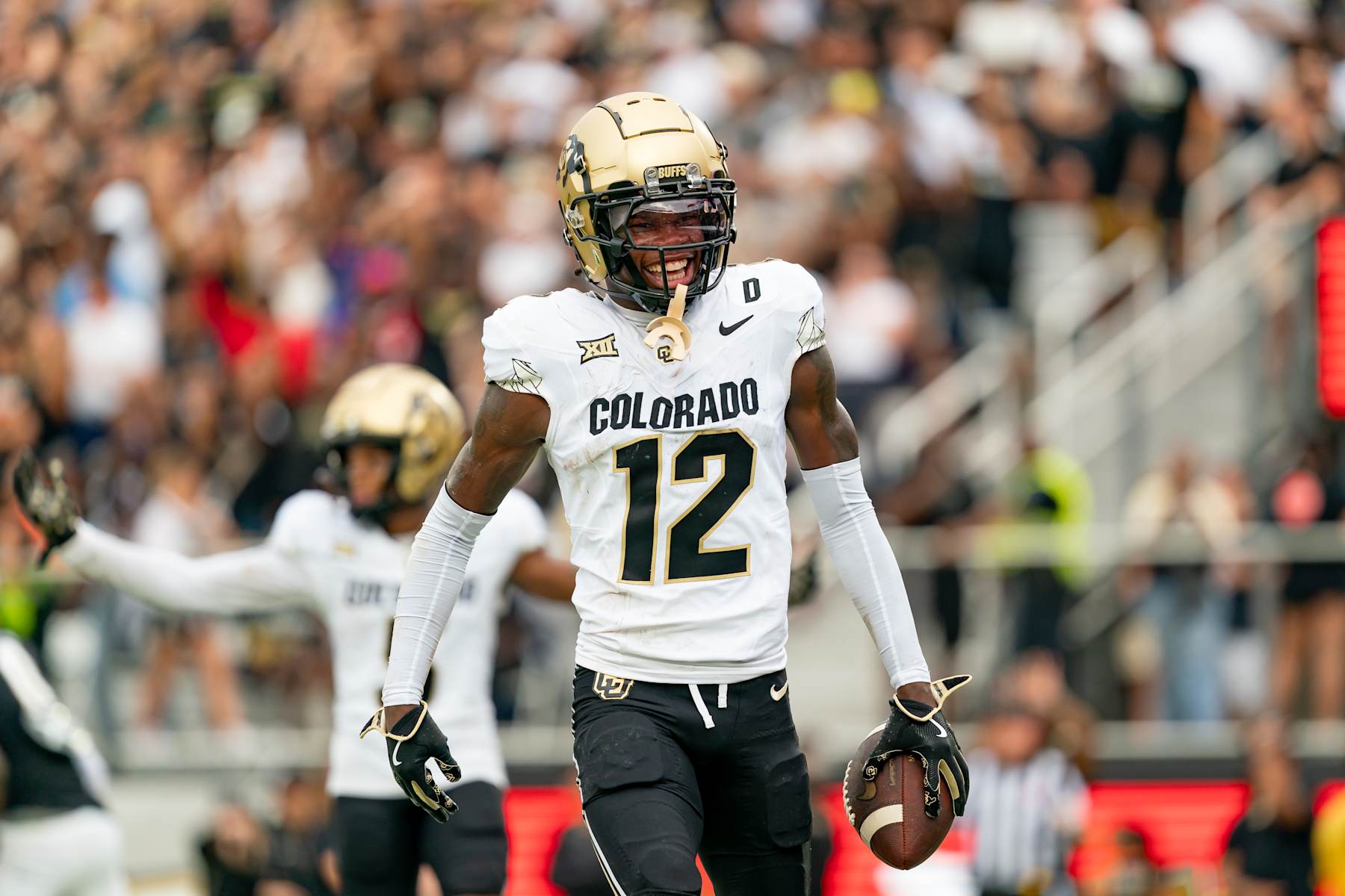 ORLANDO, FL - SEPTEMBER 28:Colorado Buffaloes wide receiver Travis Hunter (12) smiles after a touchdown during a college football game between the Colorado Buffaloes and the UCF Knights on September 28th, 2024 at FBC Mortgage Stadium in Orlando, FL. (Photo by Chris Leduc/Icon Sportswire via Getty Images)