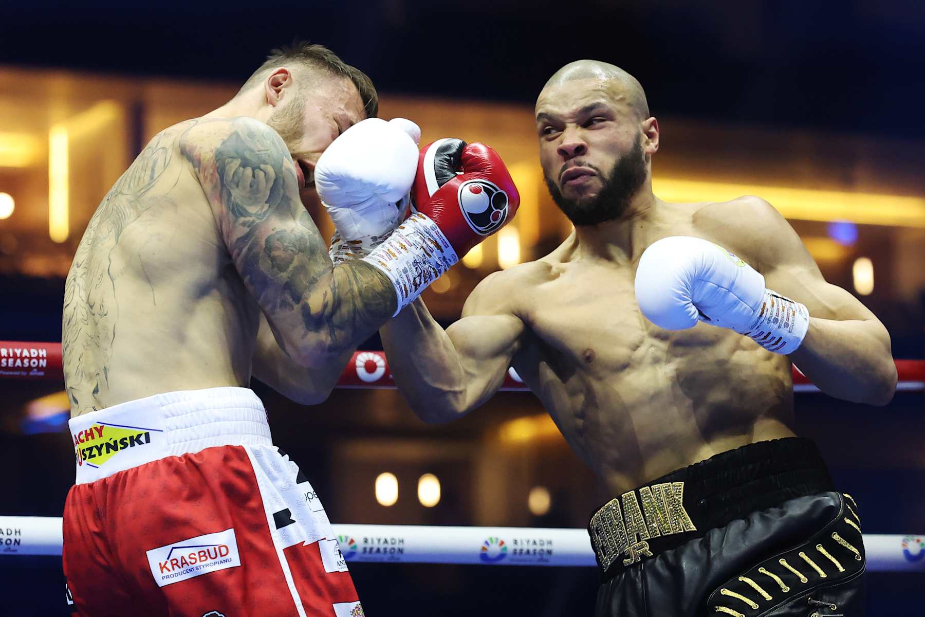 RIYADH, SAUDI ARABIA - OCTOBER 12: Chris Eubank Jr punches Kamil Szeremeta during the IBO World Middleweight title fight between Chris Eubank Jr and Kamil Szeremeta as part of the Riyadh Season - IV Crown Showdown card at Kingdom Arena on October 12, 2024 in Riyadh. (Photo by Richard Pelham/Getty Images)